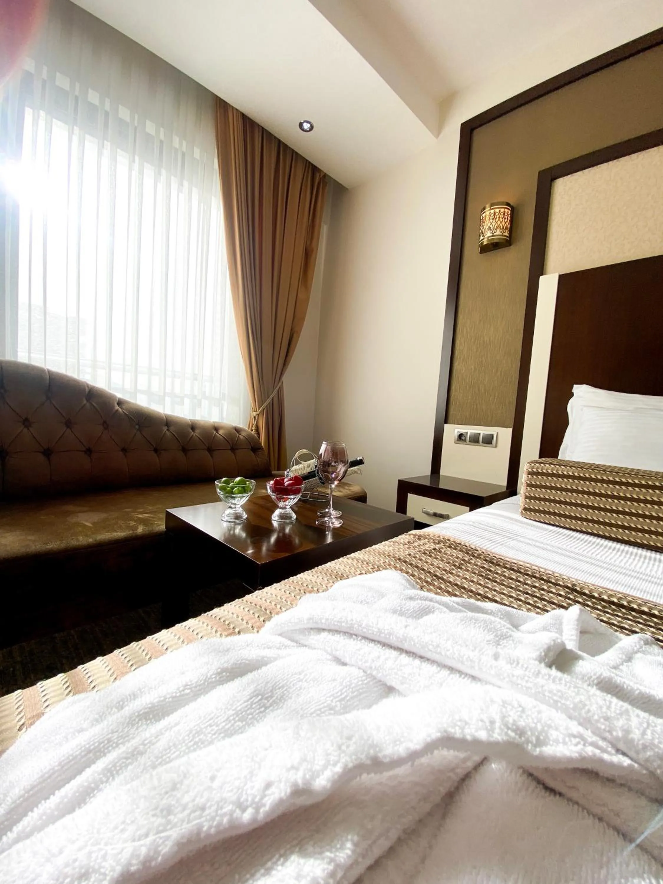 Living room, Bed in Lavin Hotel & Spa