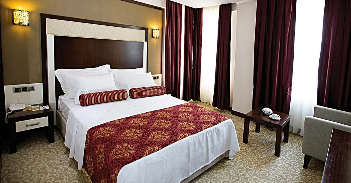 Bed in Lavin Hotel & Spa