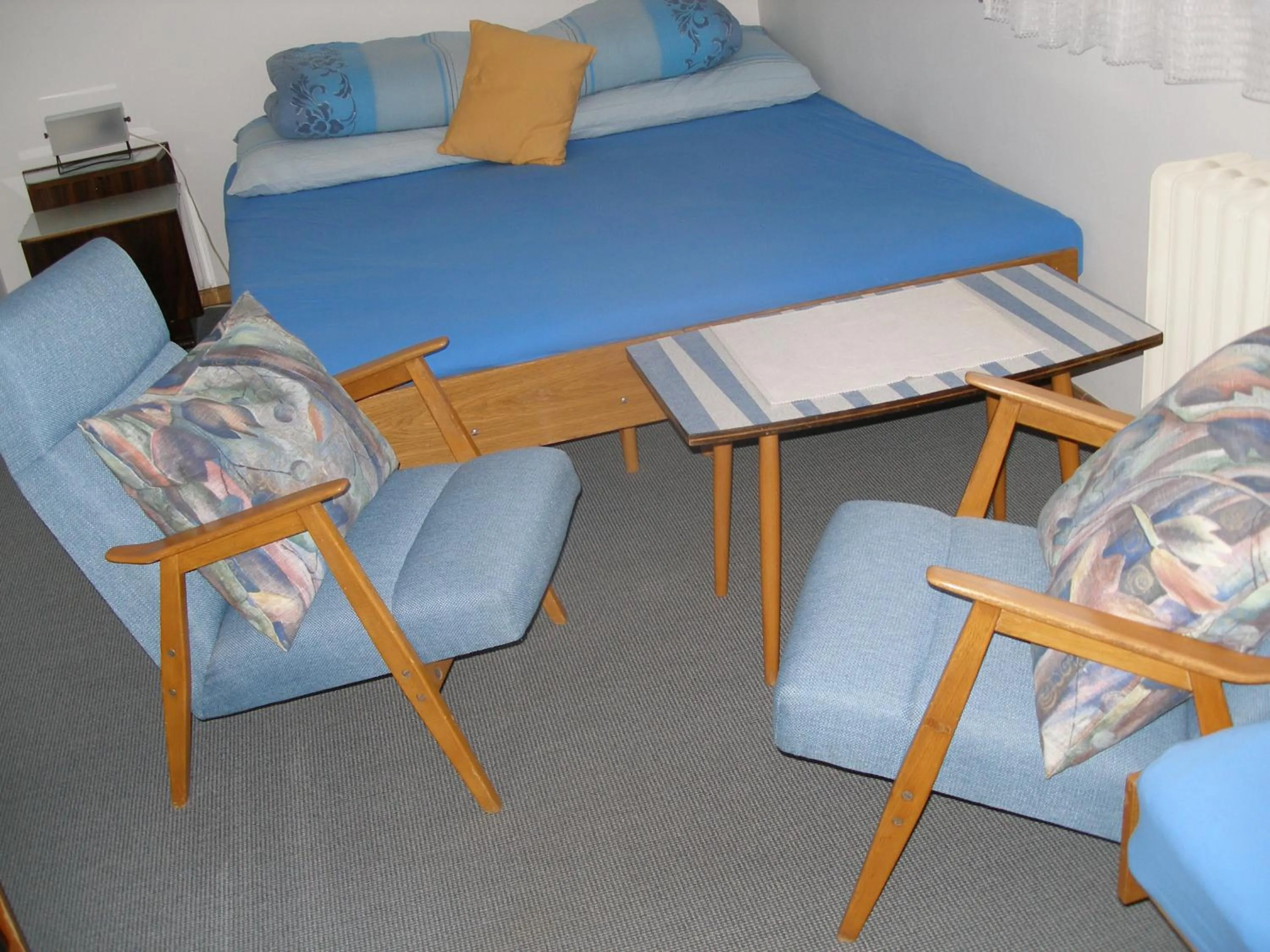 Living room, Bed in Pecka Penzion