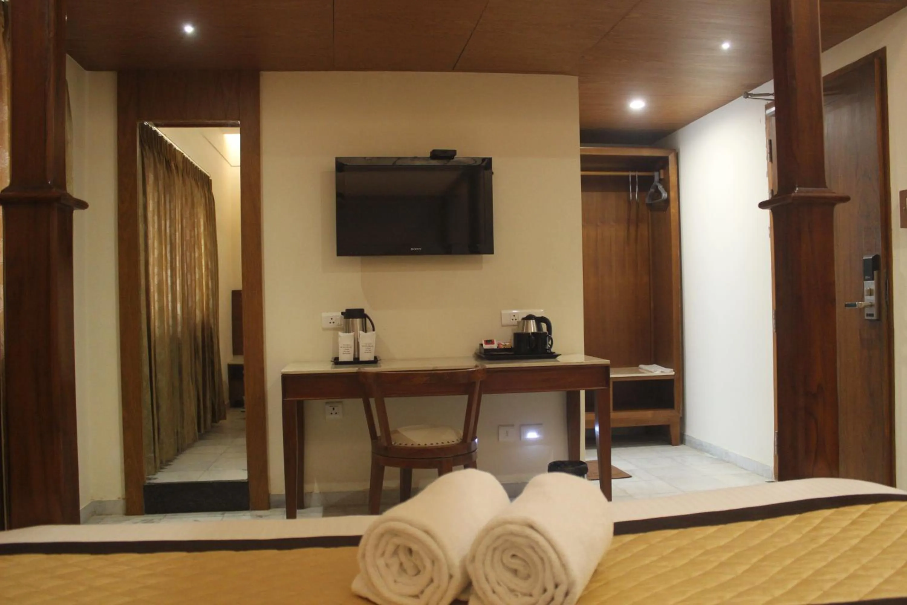 Kitchen or kitchenette in Hotel Saratharajans