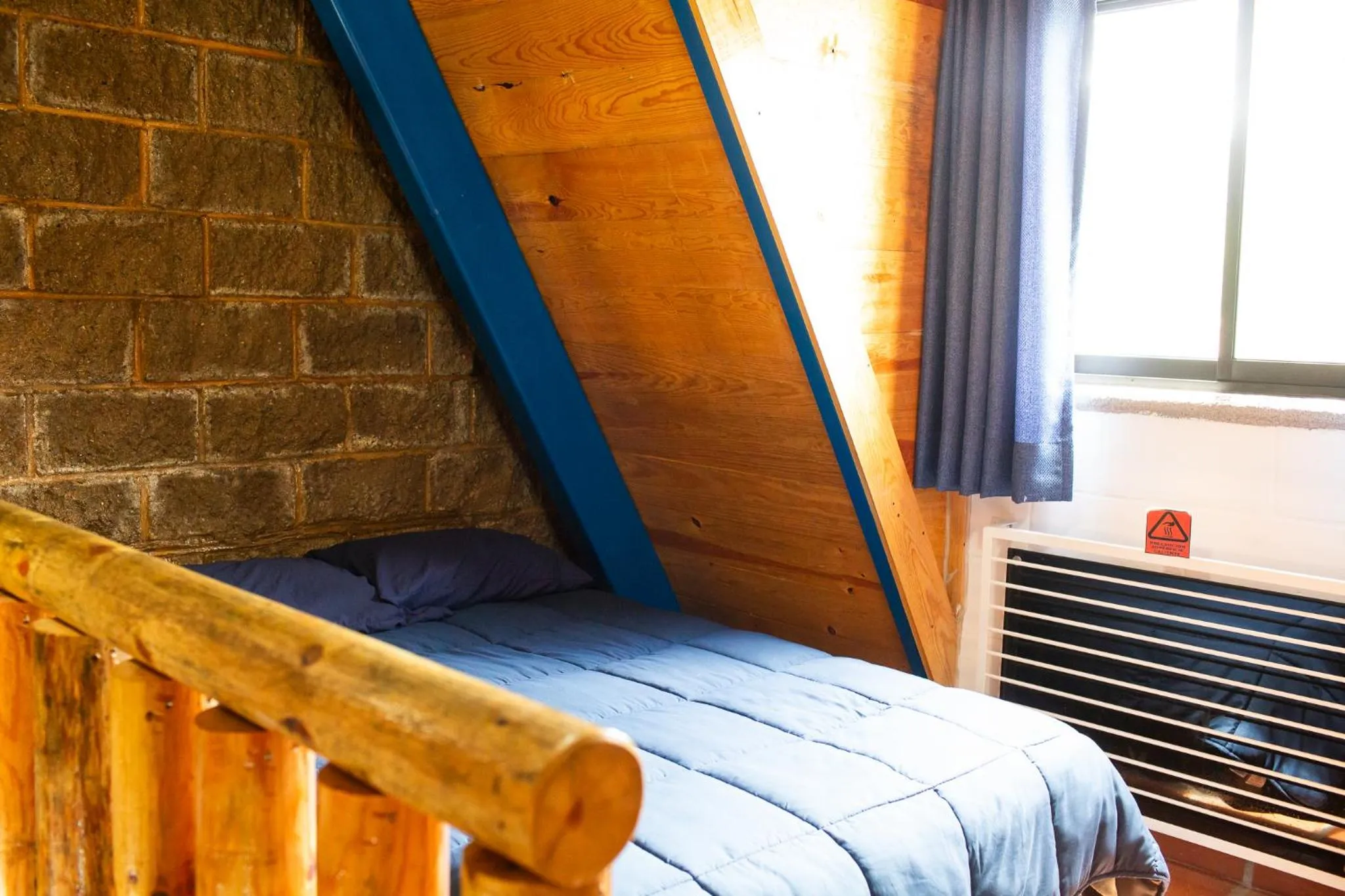 Bed in Cabañas Bungalos las Alazanas