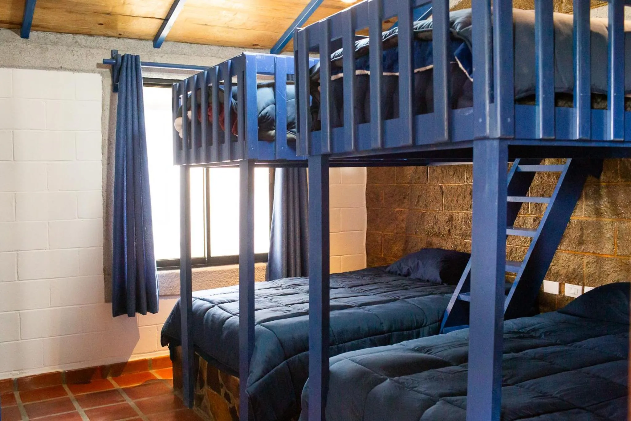 Bed in Cabañas Bungalos las Alazanas