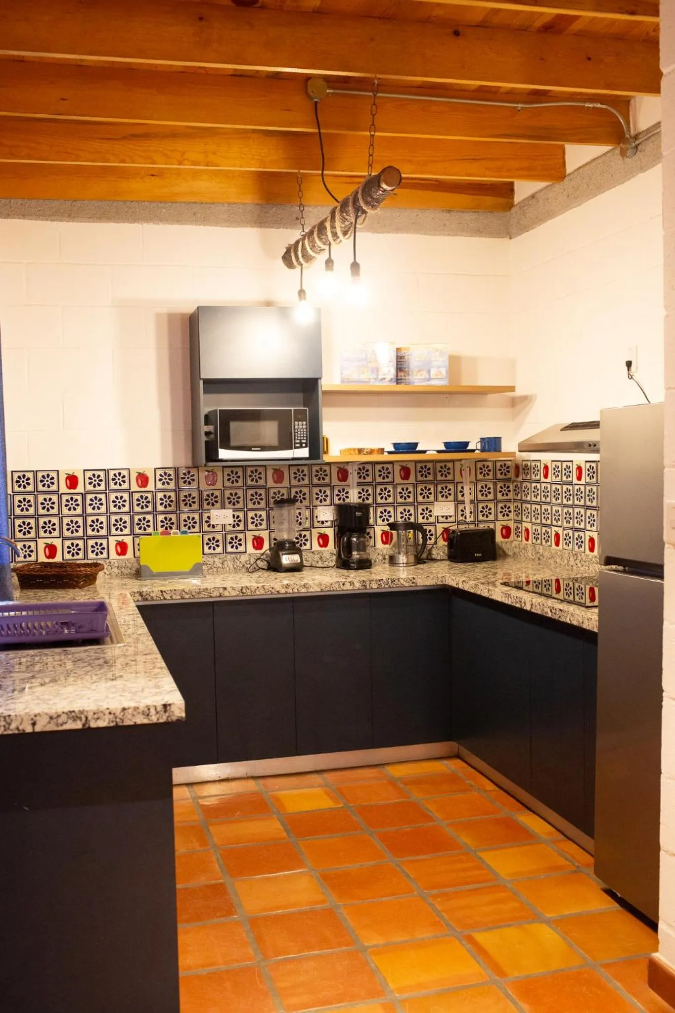 Kitchen or kitchenette in Cabañas Bungalos las Alazanas