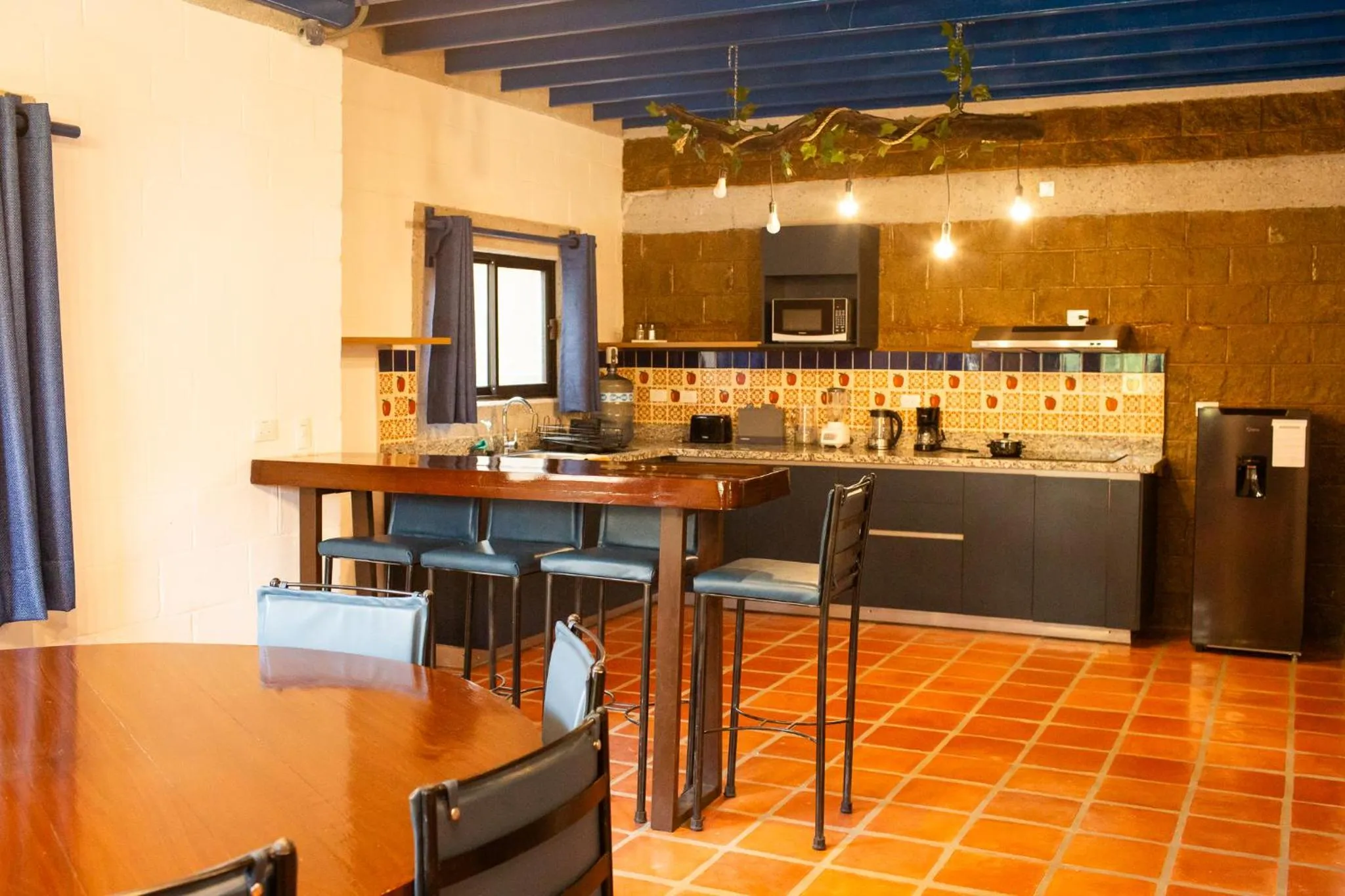 Kitchen or kitchenette in Cabañas Bungalos las Alazanas