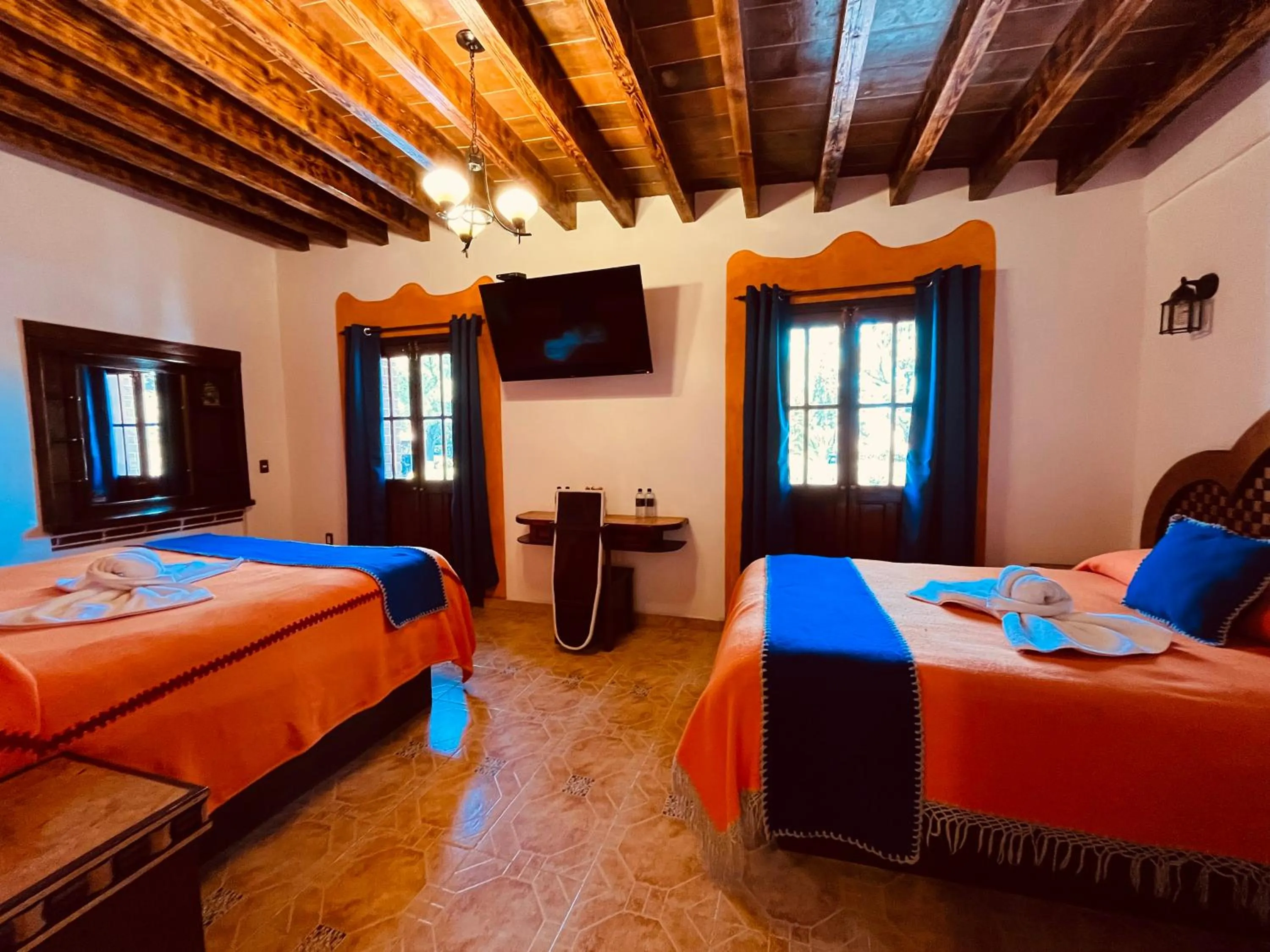 Photo of the whole room, Bed in Hotel El Aguila, Villa del Carbón