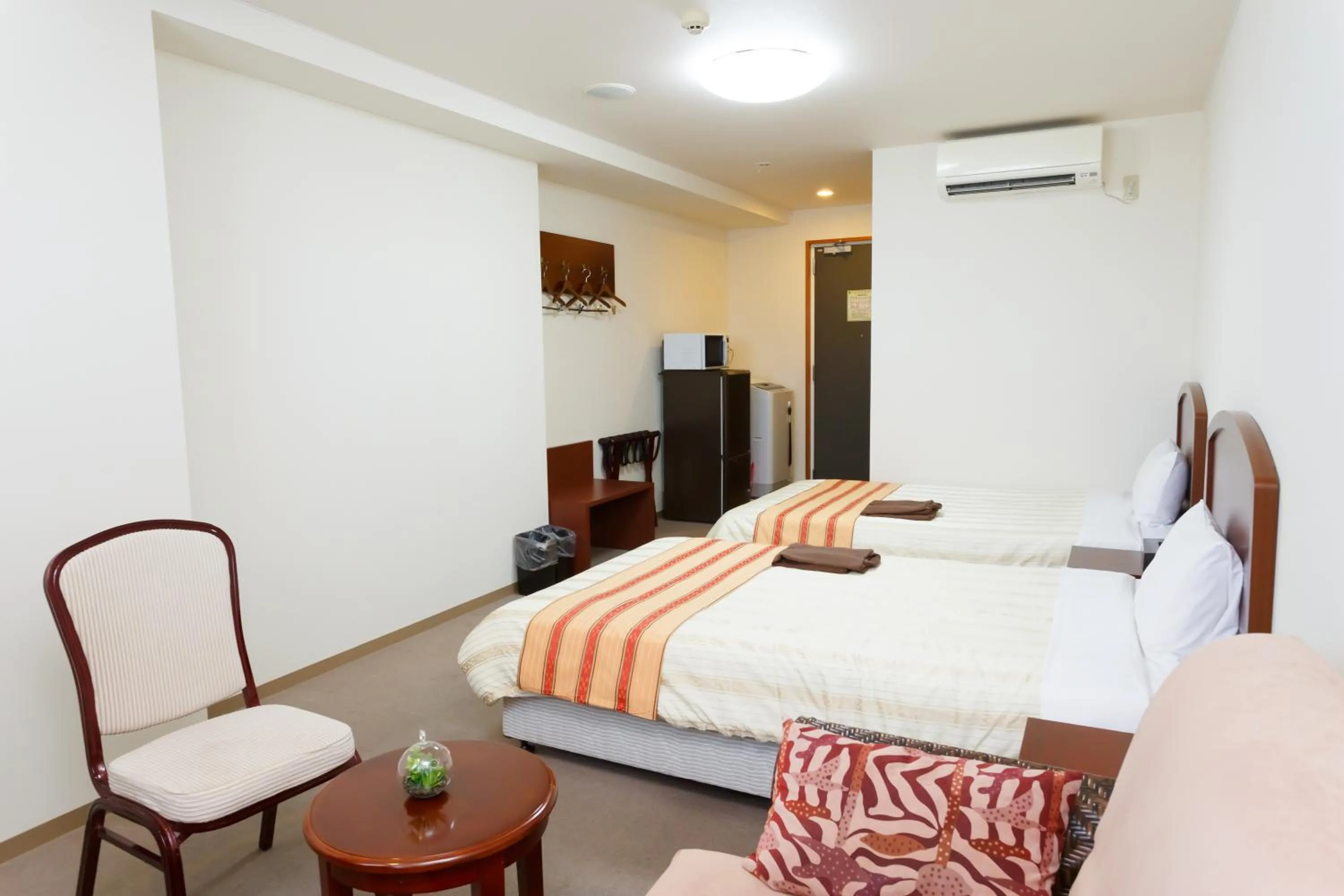 Photo of the whole room, Bed in Hotel Peace Island Miyakojima Shiyakusho Tori