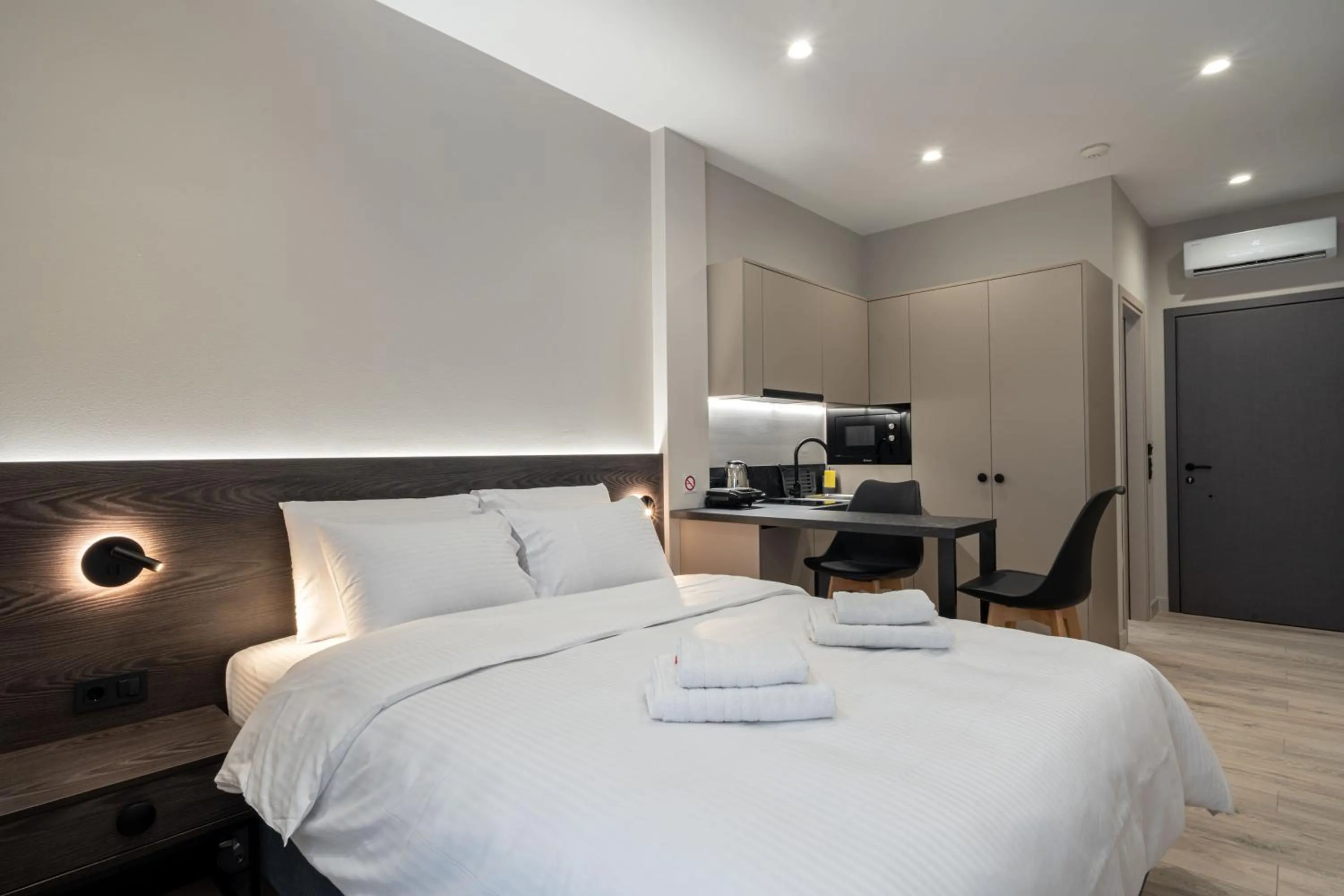 Bed in D Suites & Rooms