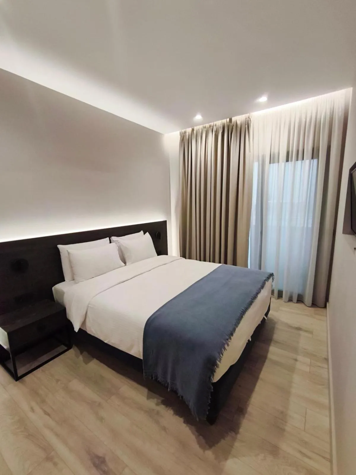 Bed in D Suites & Rooms