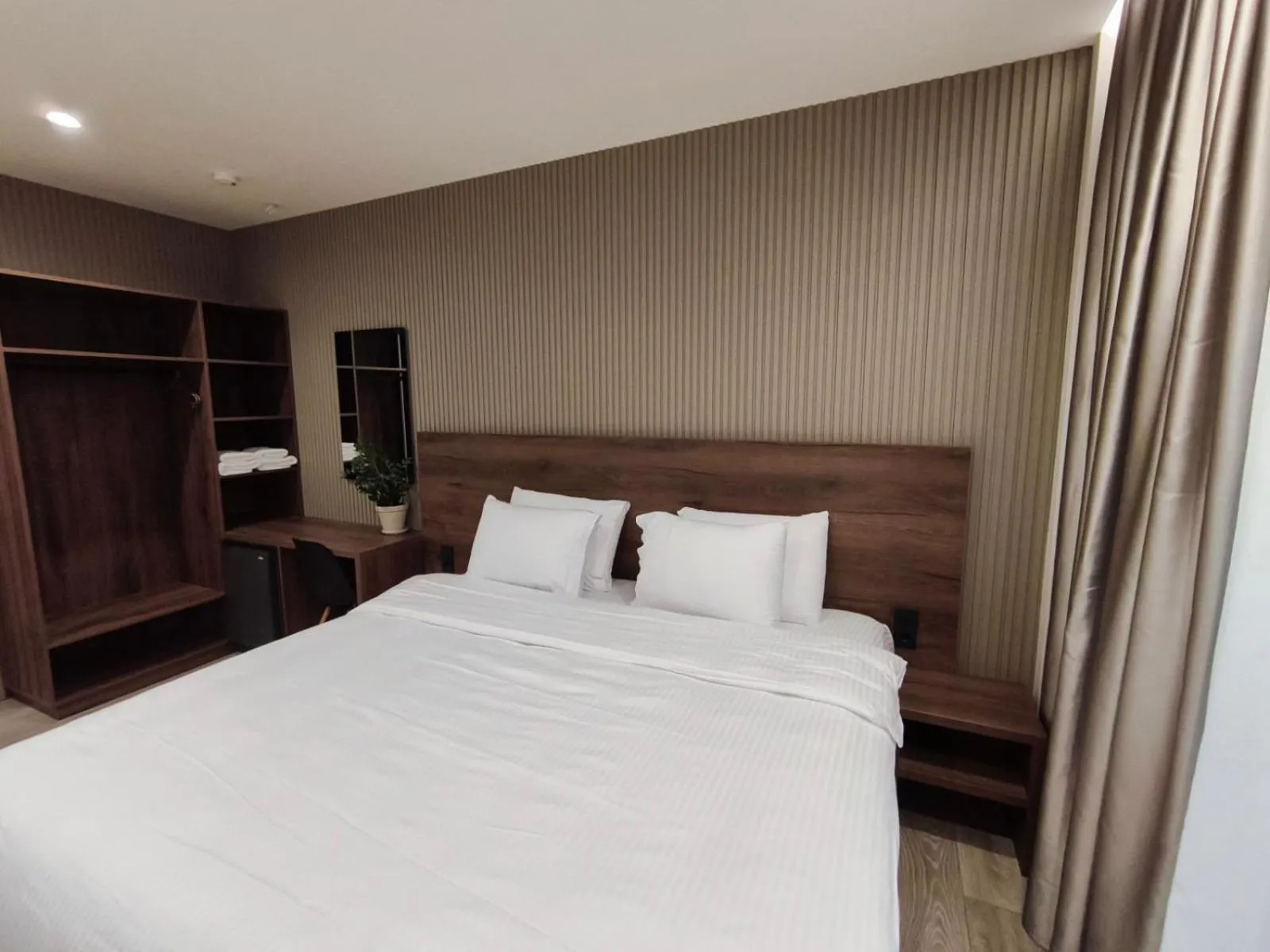 Photo of the whole room, Bed in D Suites & Rooms