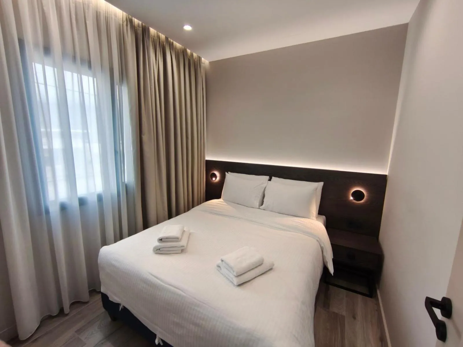Bed in D Suites & Rooms