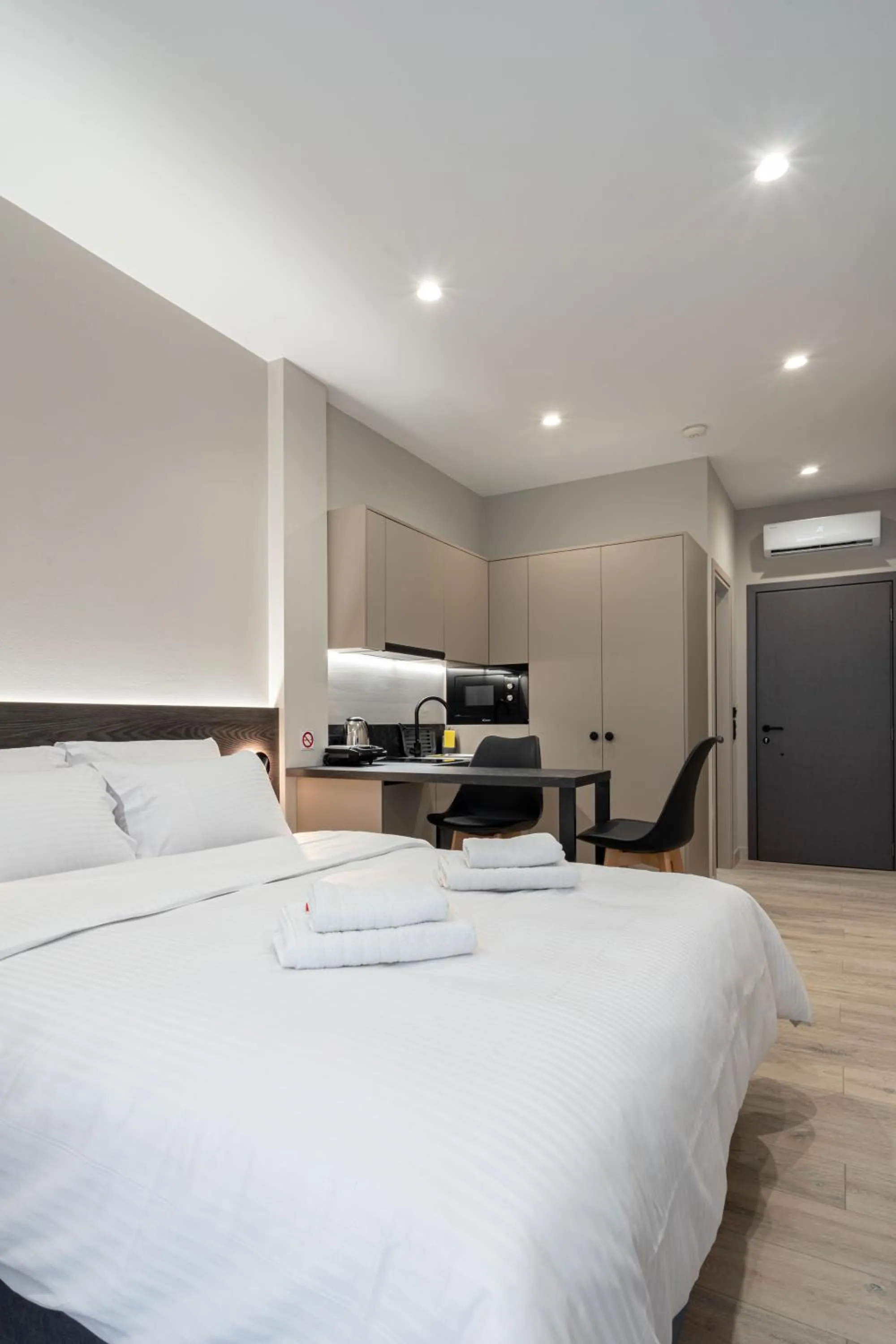Bed in D Suites & Rooms