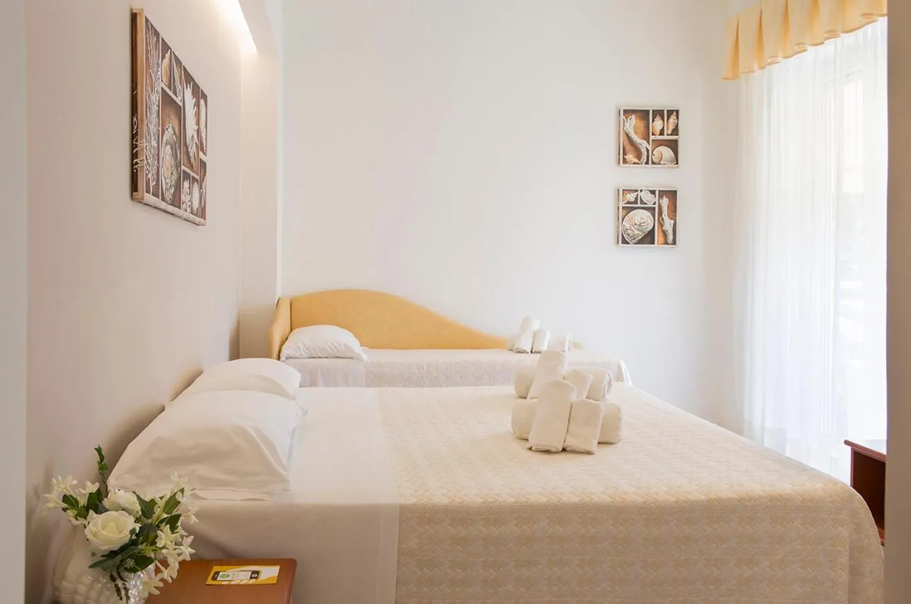 Bed in Hotel Pacific