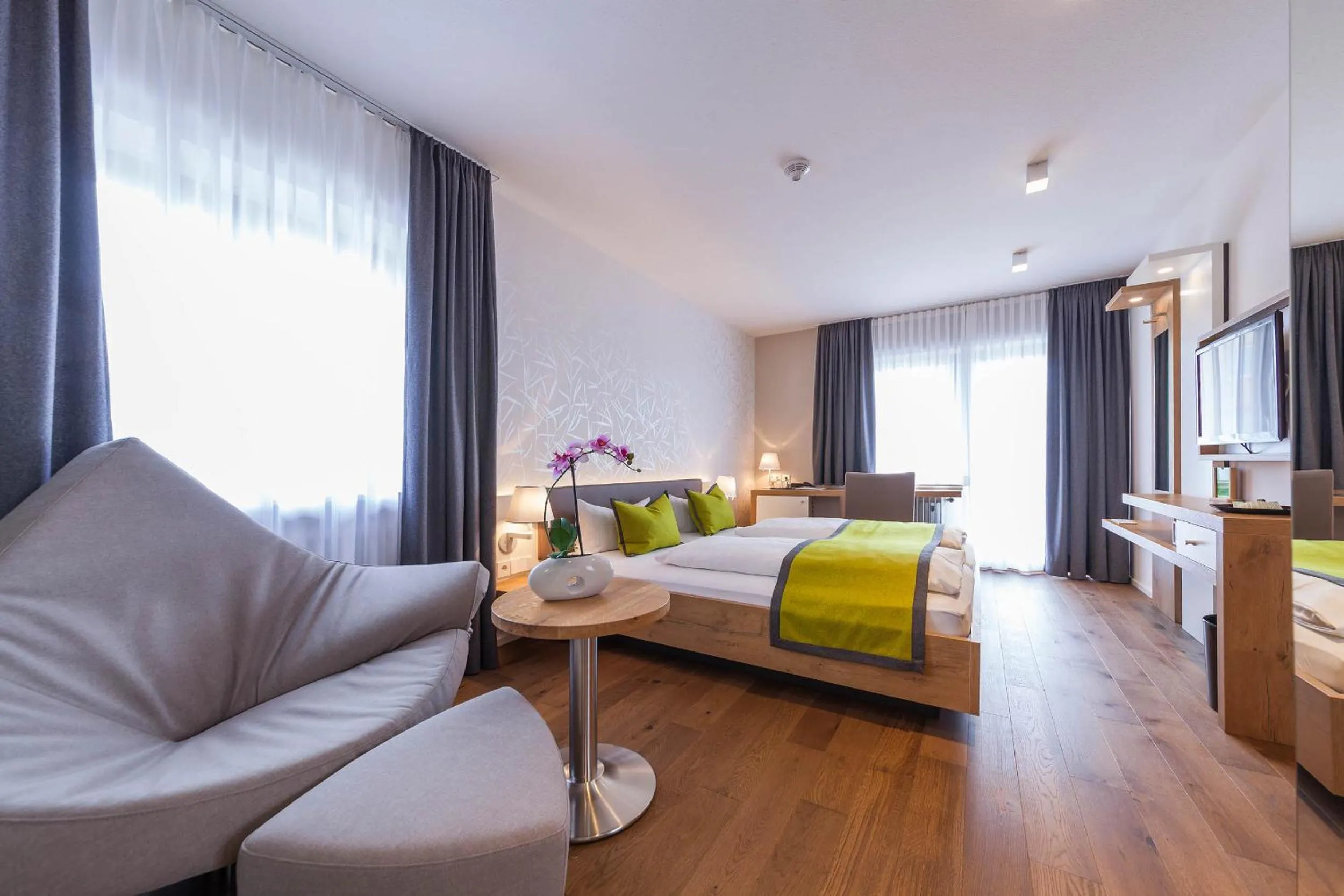 Double Room With Balcony and Partial Lake View in Hotel Restaurant Hansjakob