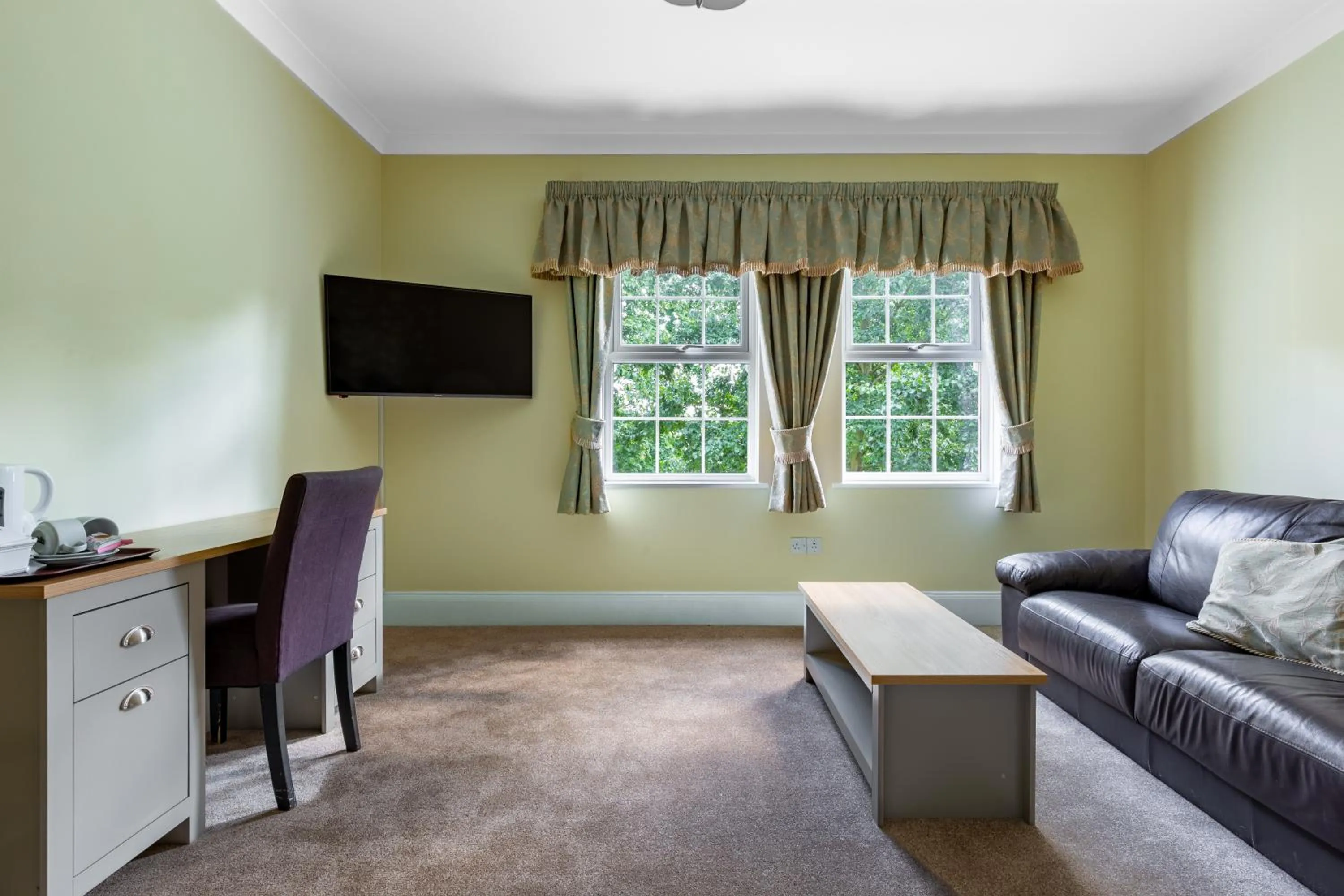 Bedroom in Woodland Manor Hotel