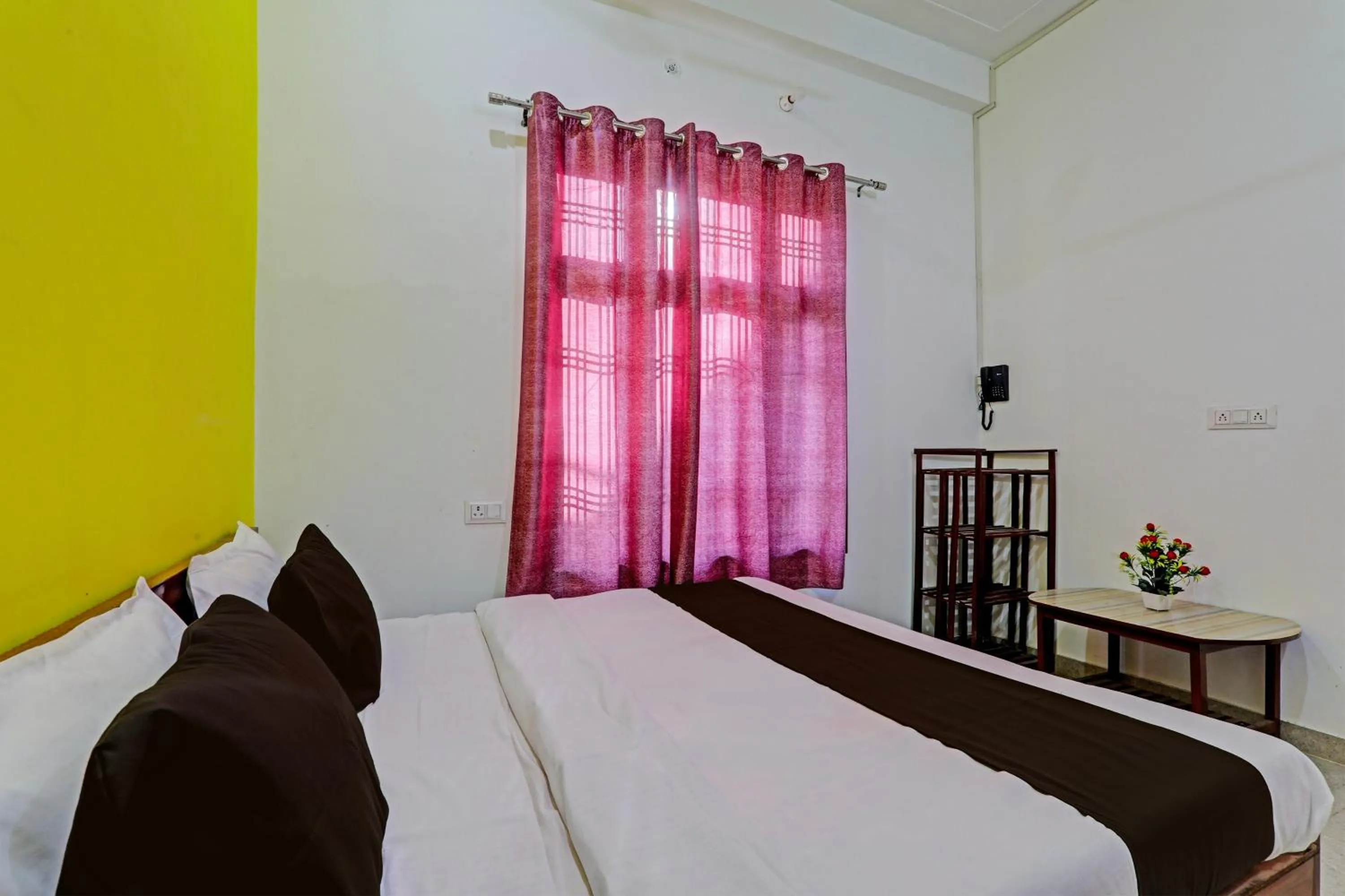 Bedroom in Hotel O Vikas Inn