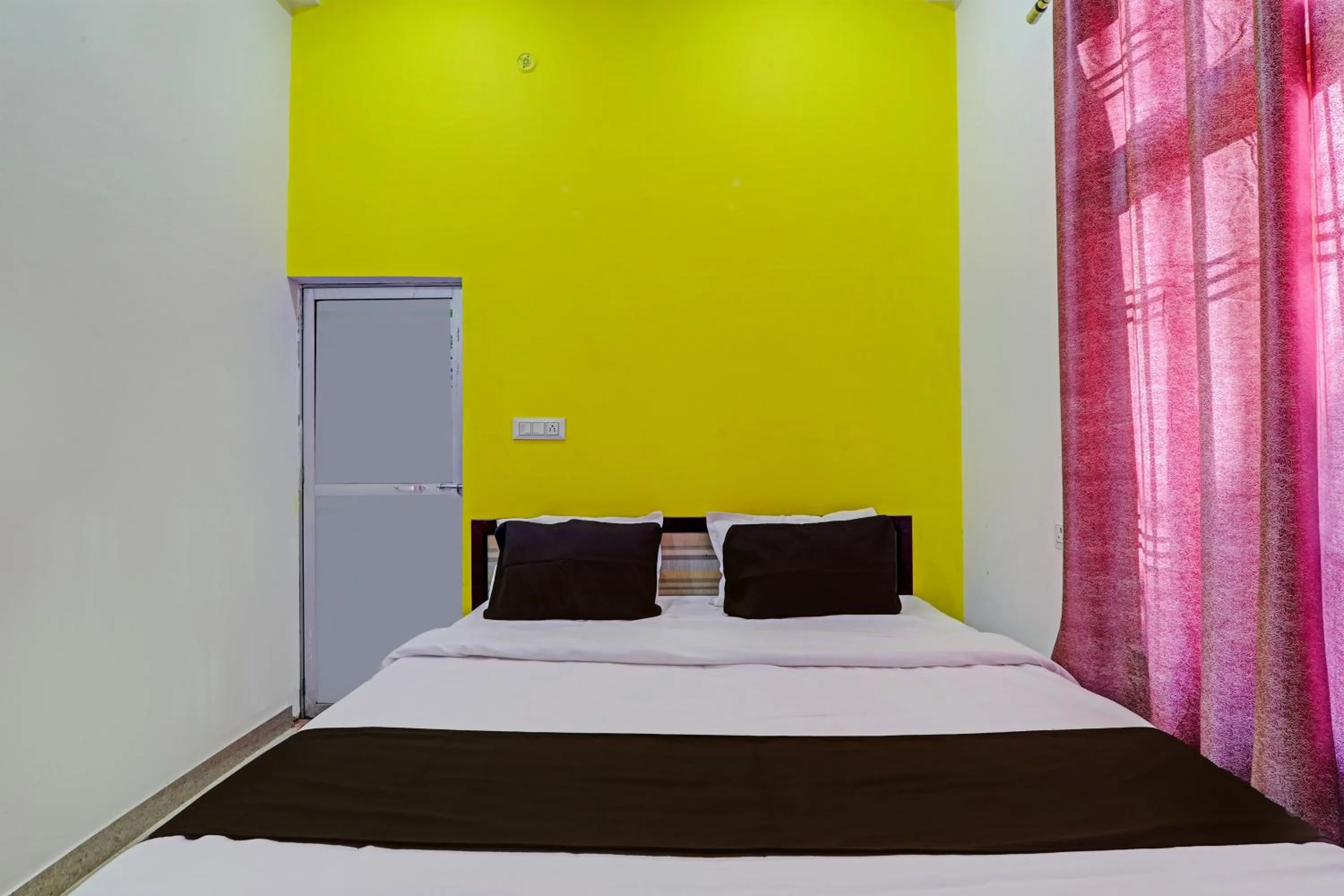 Bedroom in Hotel O Vikas Inn