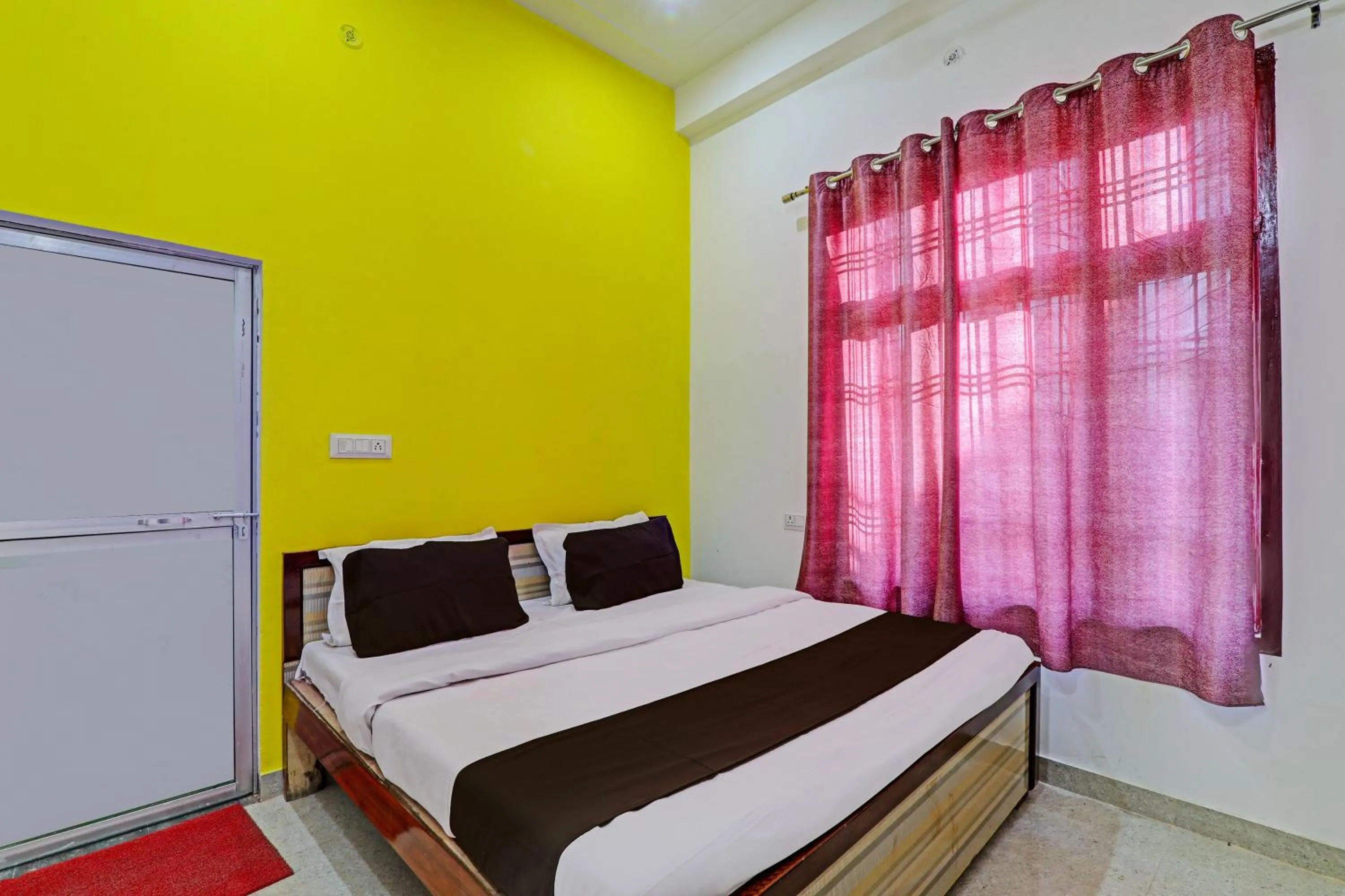 Bedroom in Hotel O Vikas Inn