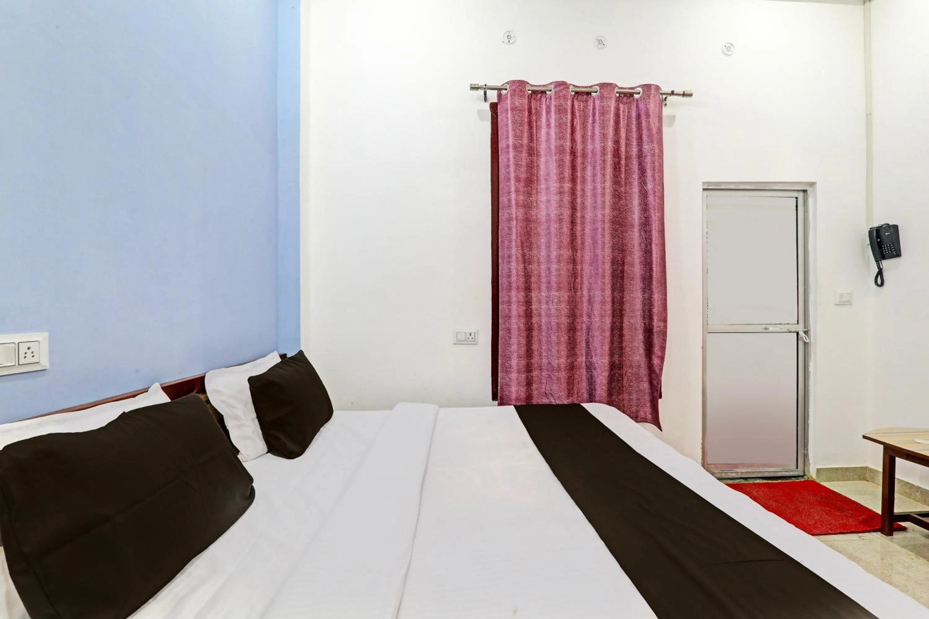 Bedroom in Hotel O Vikas Inn