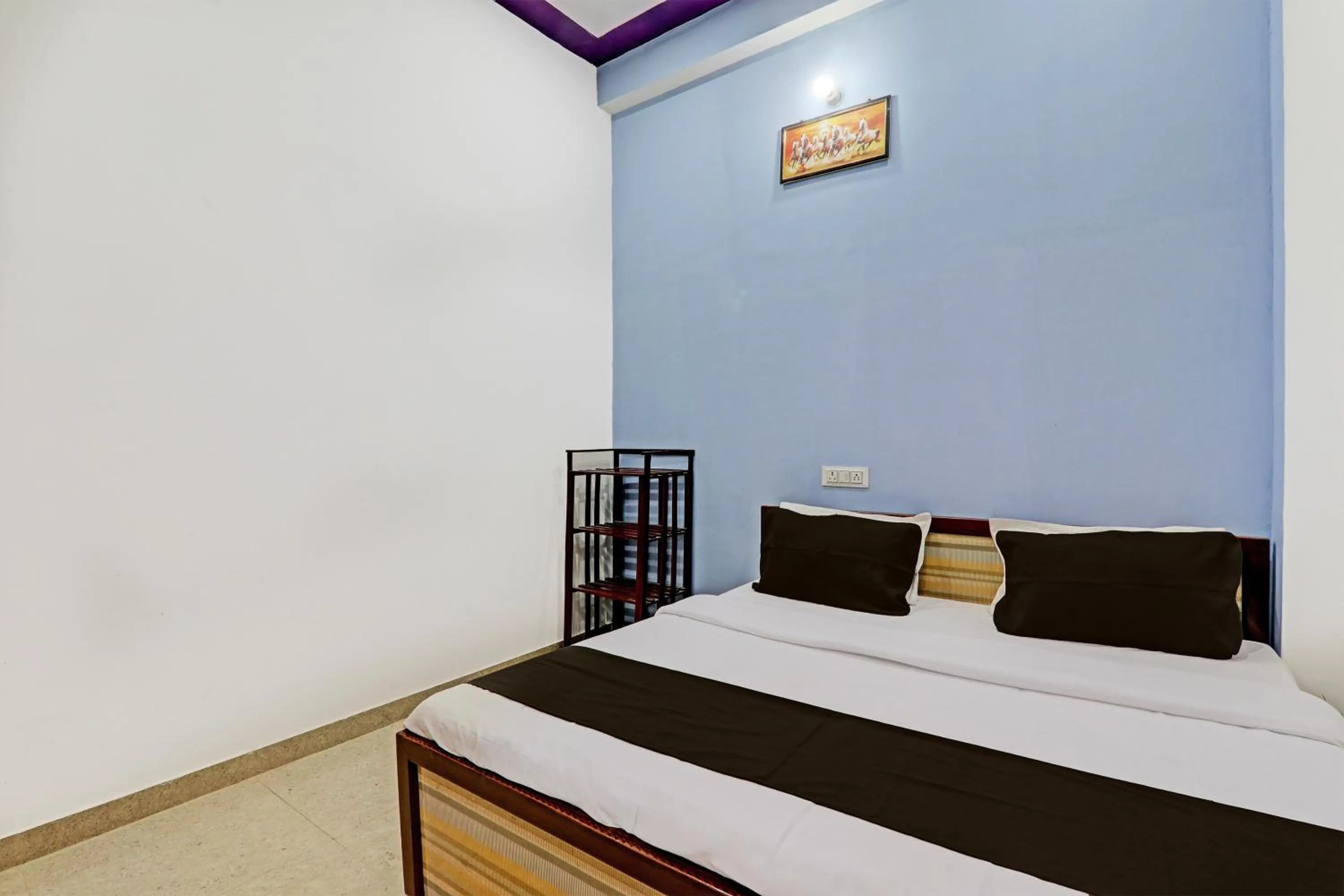 Bedroom in Hotel O Vikas Inn