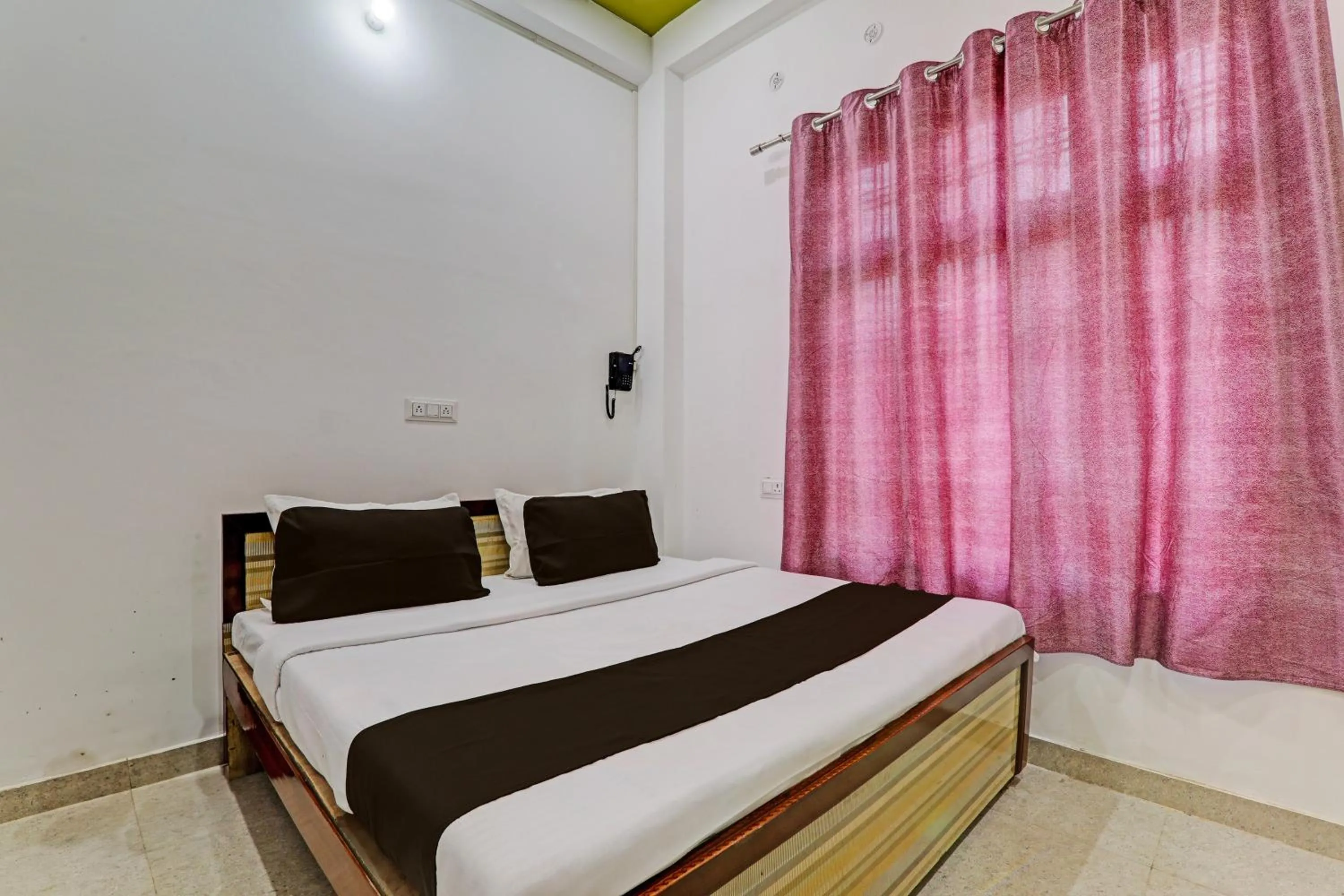 Bedroom in Hotel O Vikas Inn