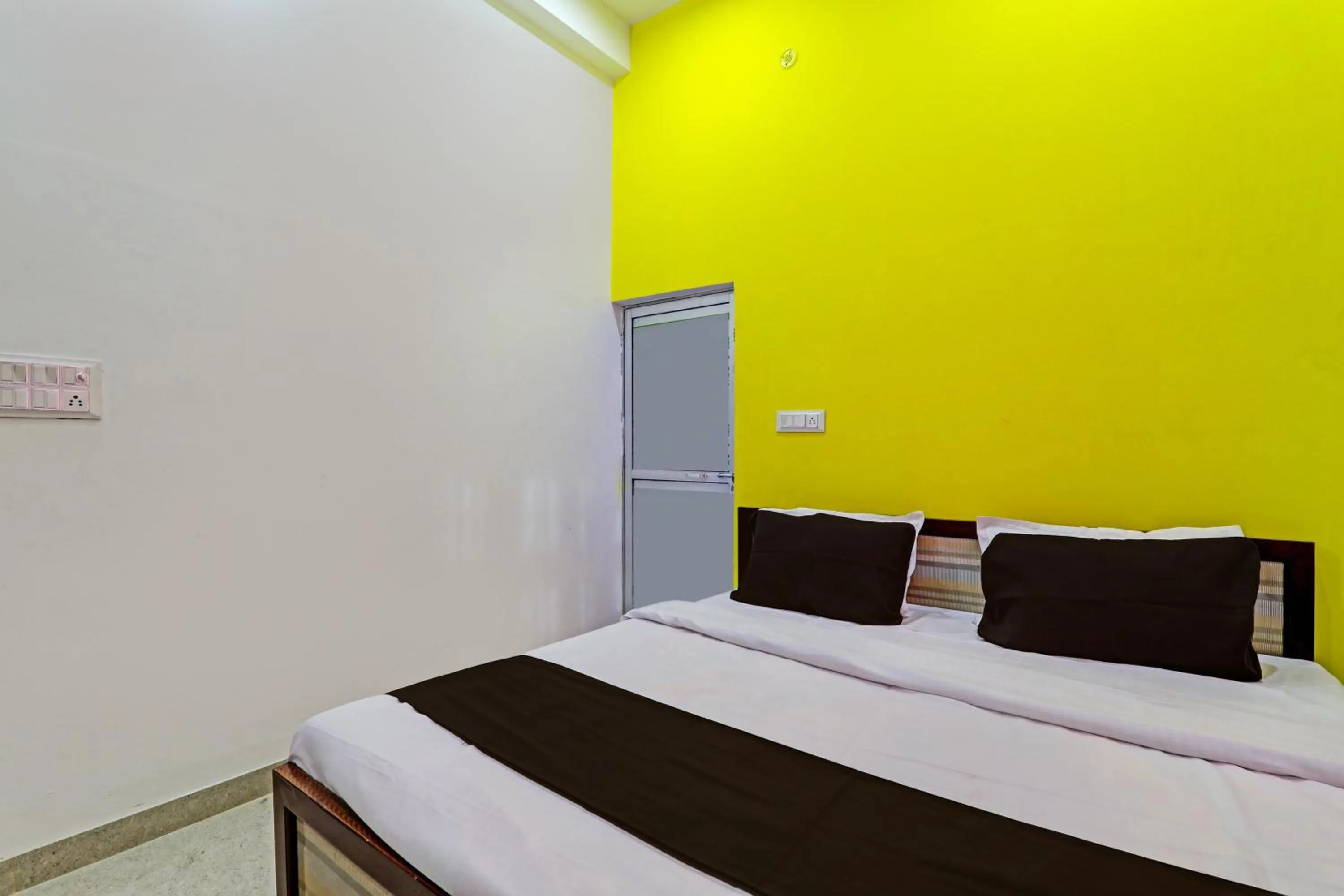 Bedroom in Hotel O Vikas Inn
