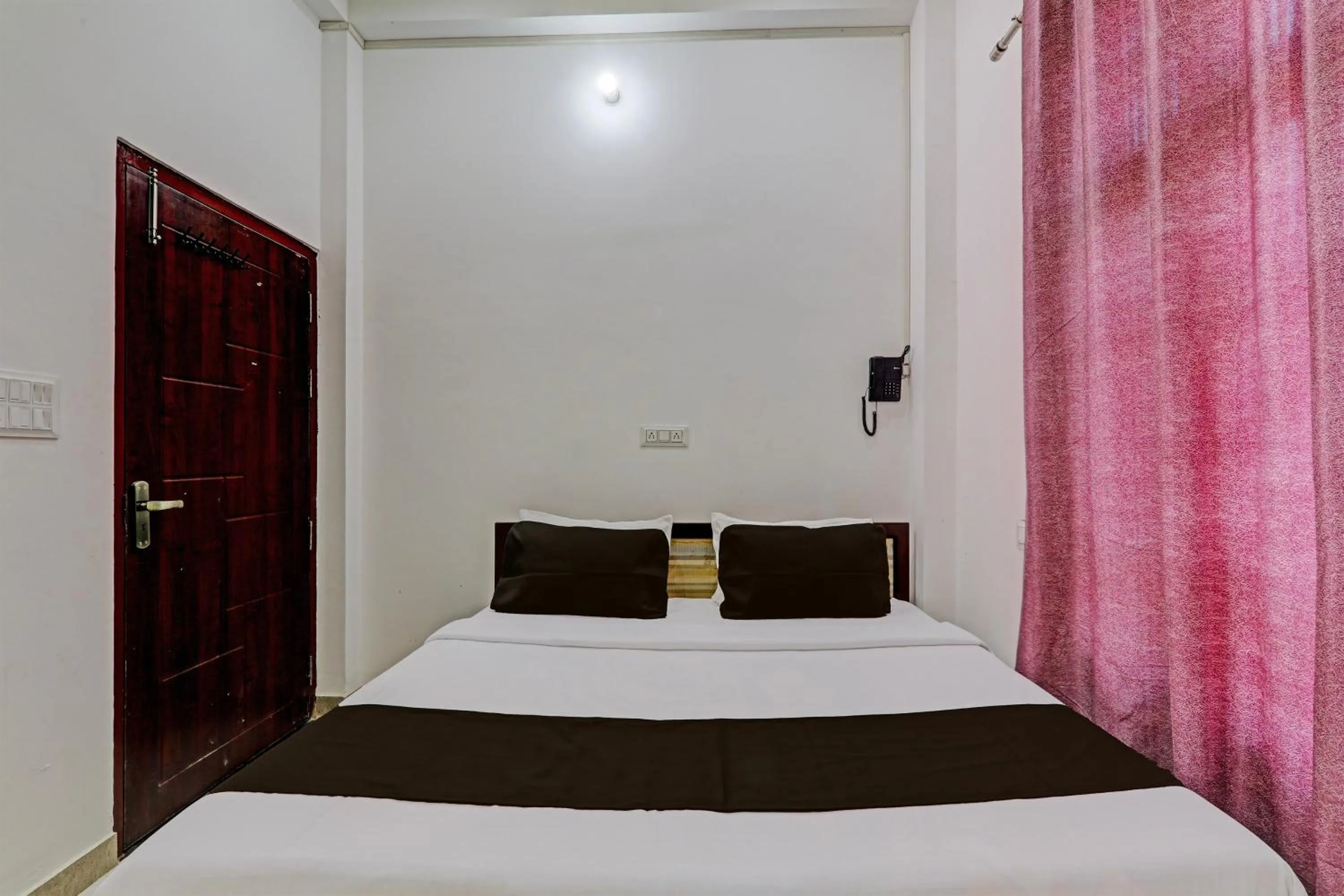 Bedroom in Hotel O Vikas Inn