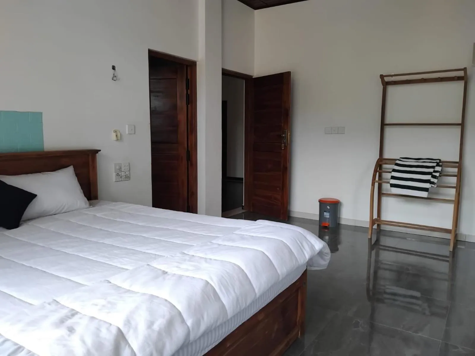 Bed in Esha Beach Resort Rooms