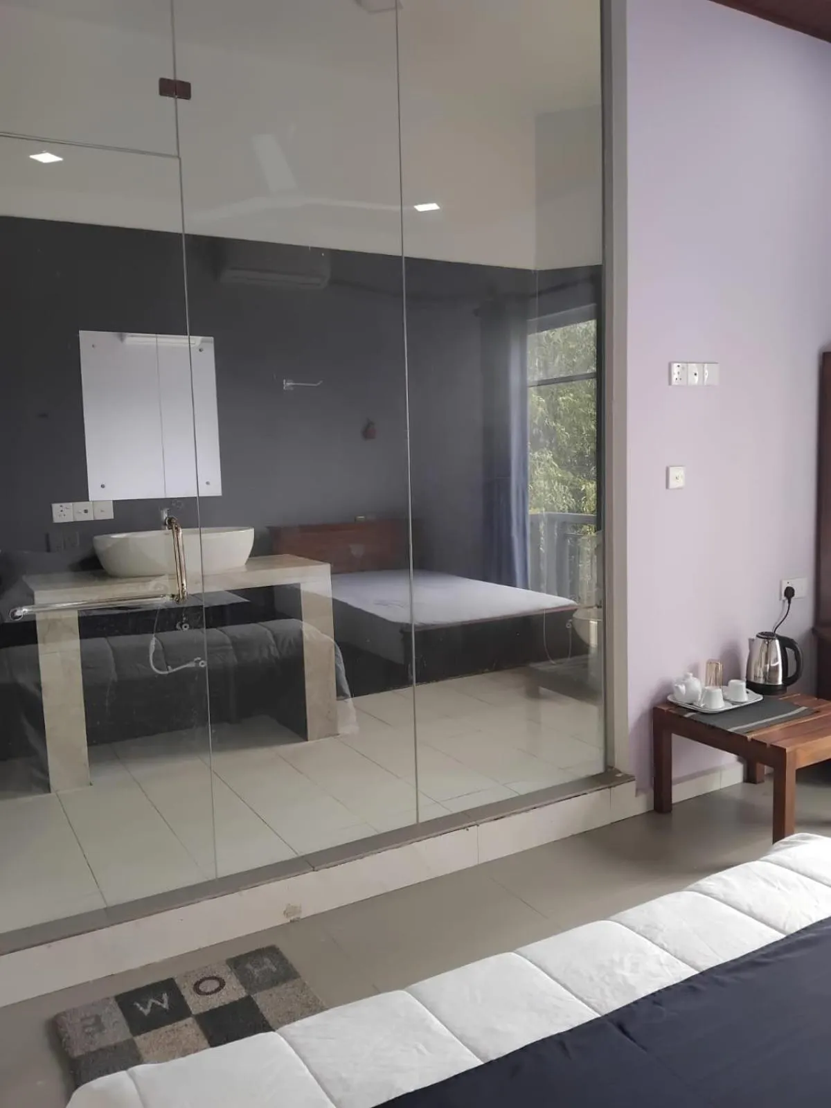 Bed in Esha Beach Resort Rooms