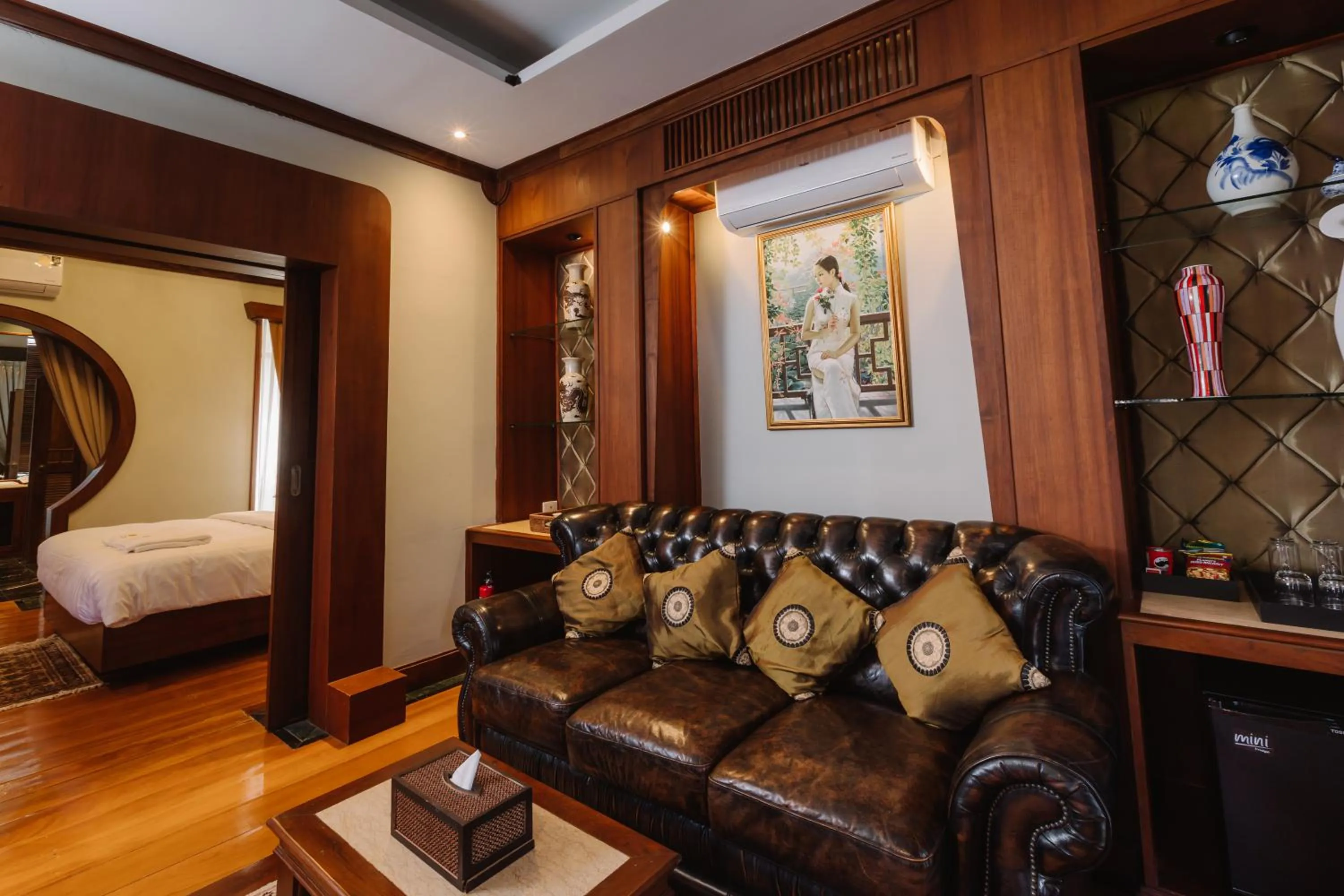 Seating area, Bed in Lunar Mansion Hotel