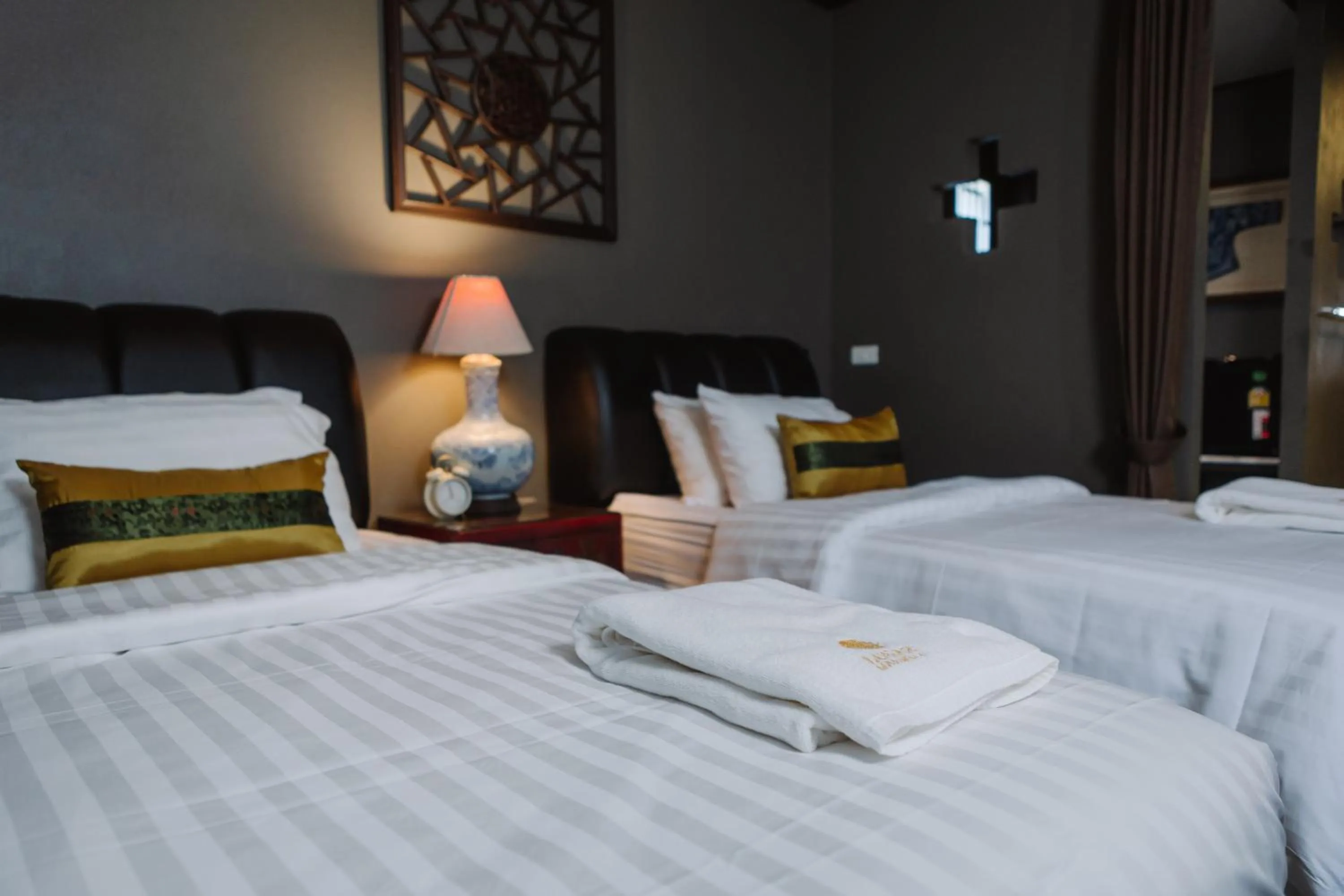 Bed in Lunar Mansion Hotel