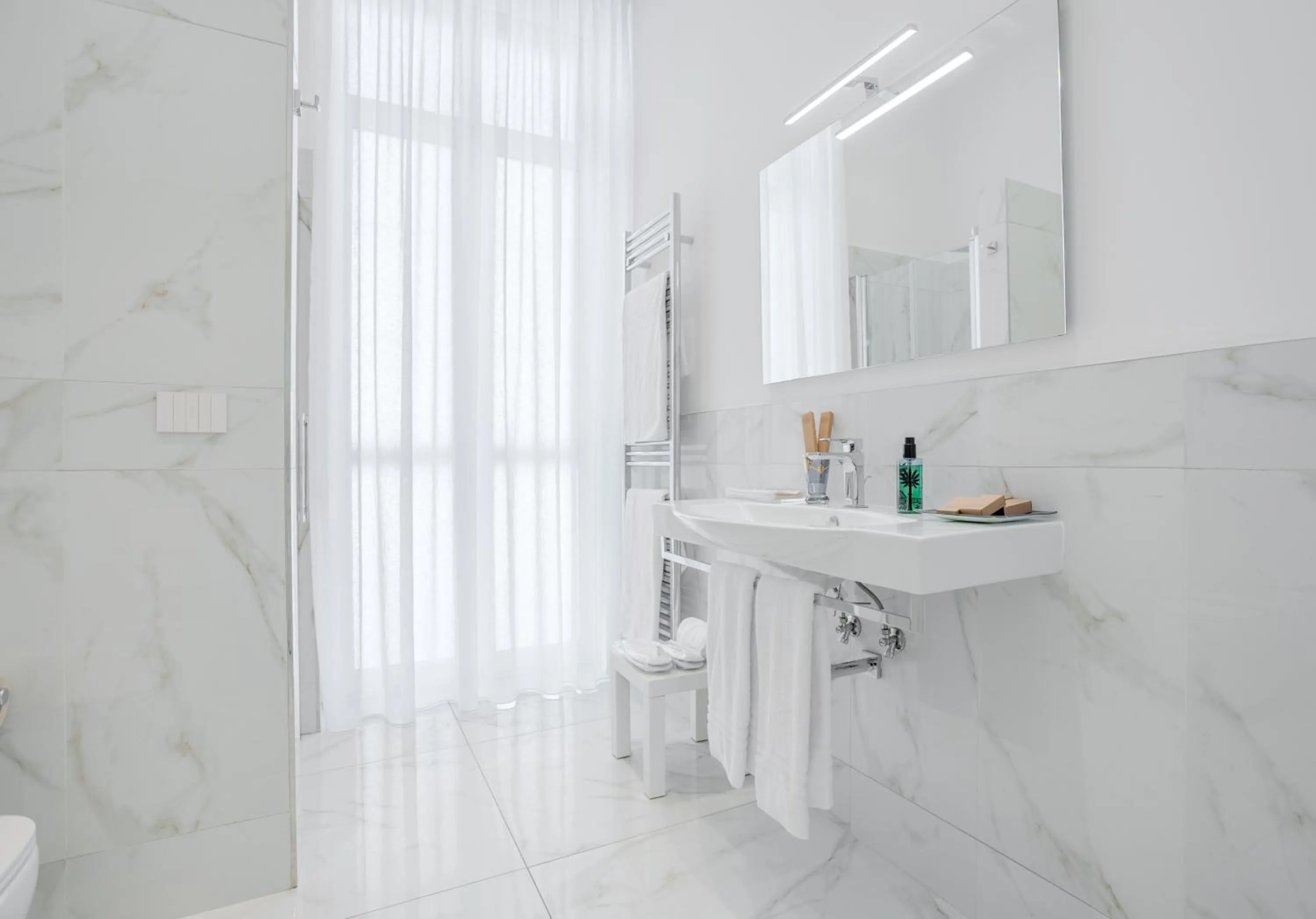 Bathroom in La Corte dei Mille Luxury