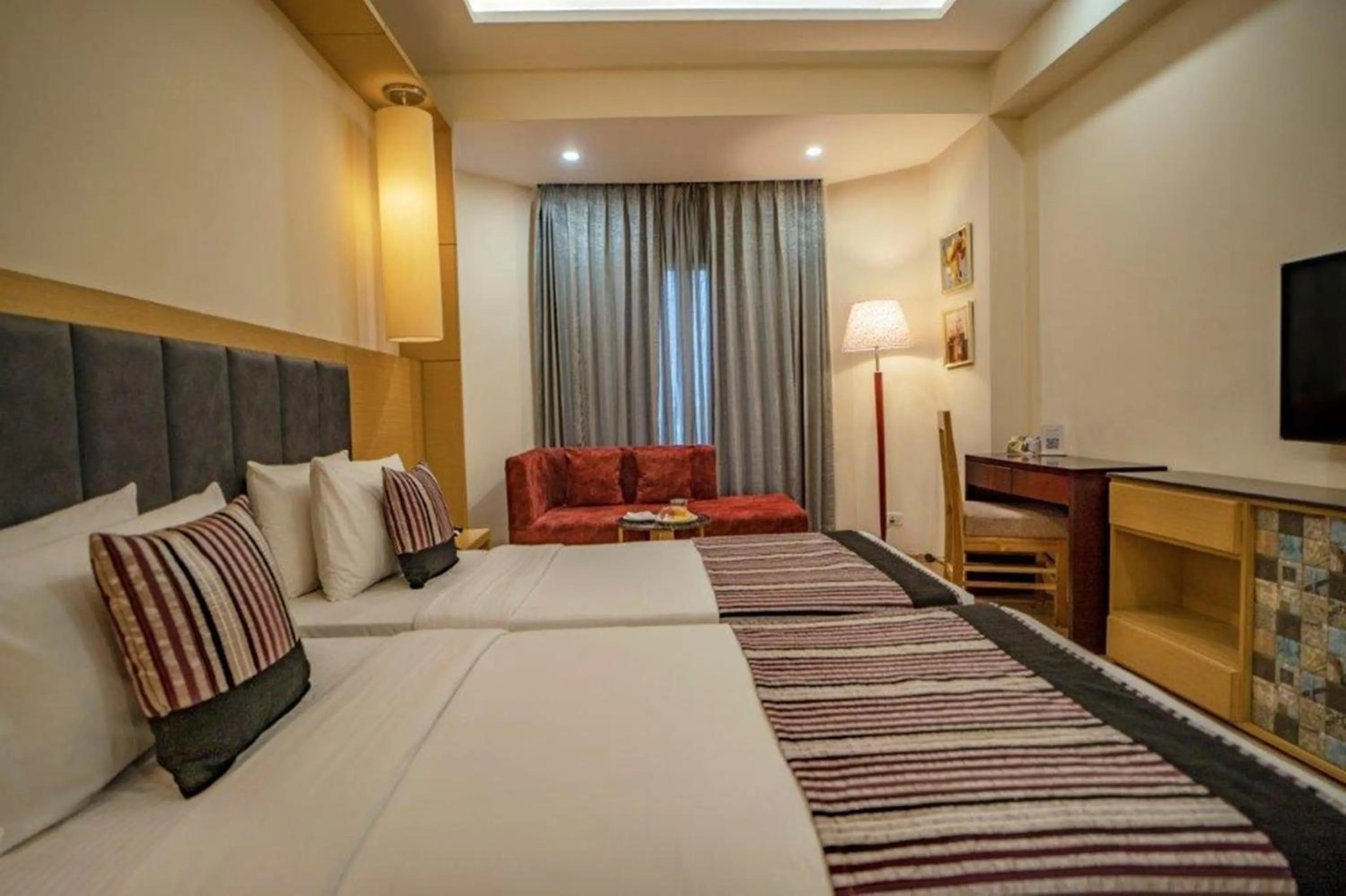 Bedroom in Golden Tulip Udaipur