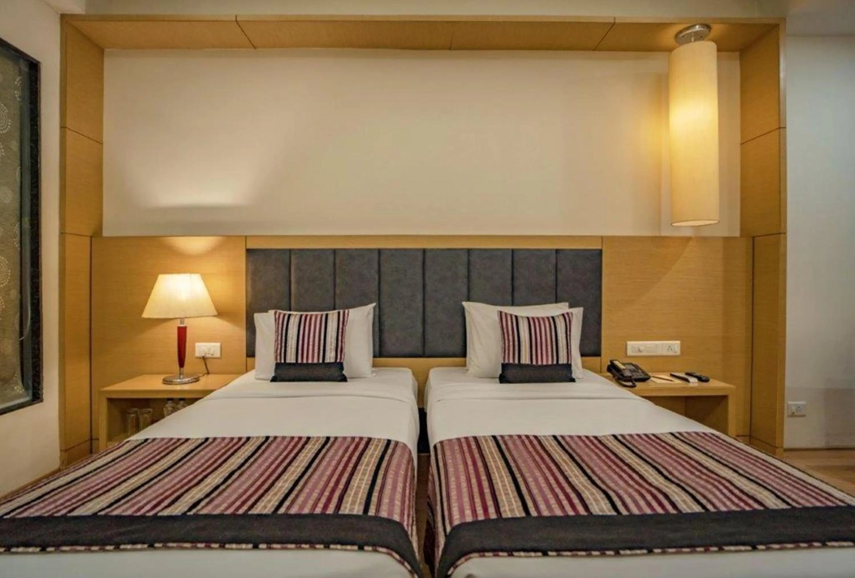 Bedroom in Golden Tulip Udaipur