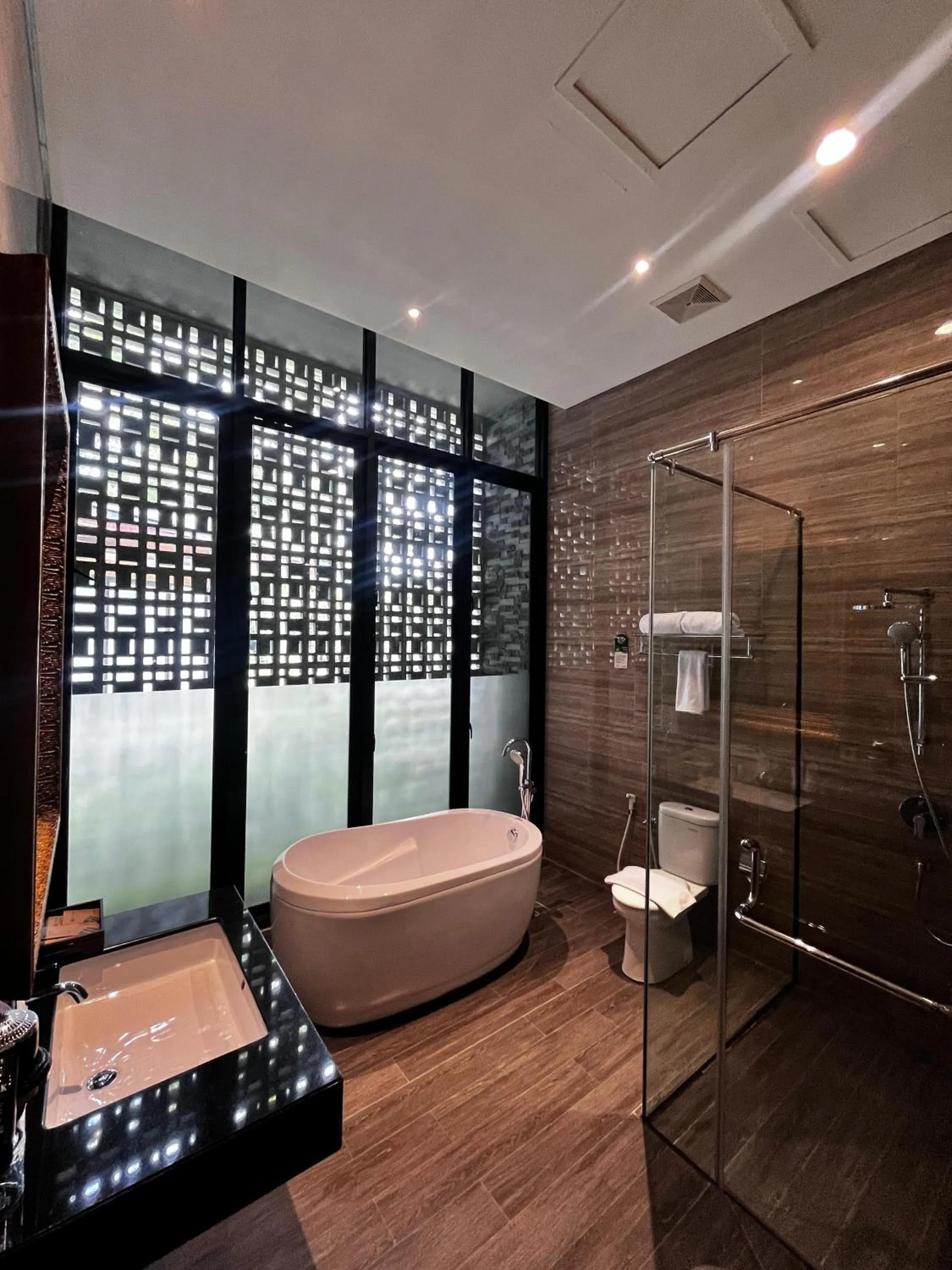 Bathroom in Wyndham Garden Yogyakarta Hotel Conference & Action Park
