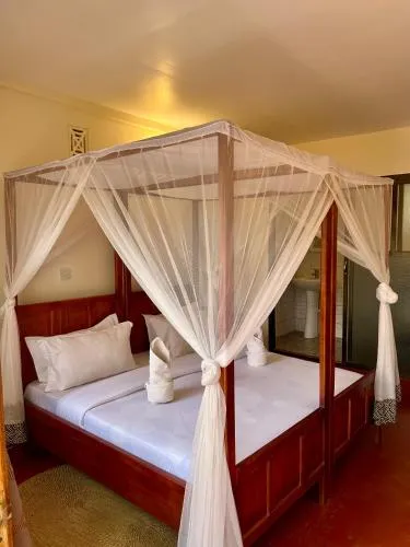 Bed in Patamu Restaurants Lodge & Safaris