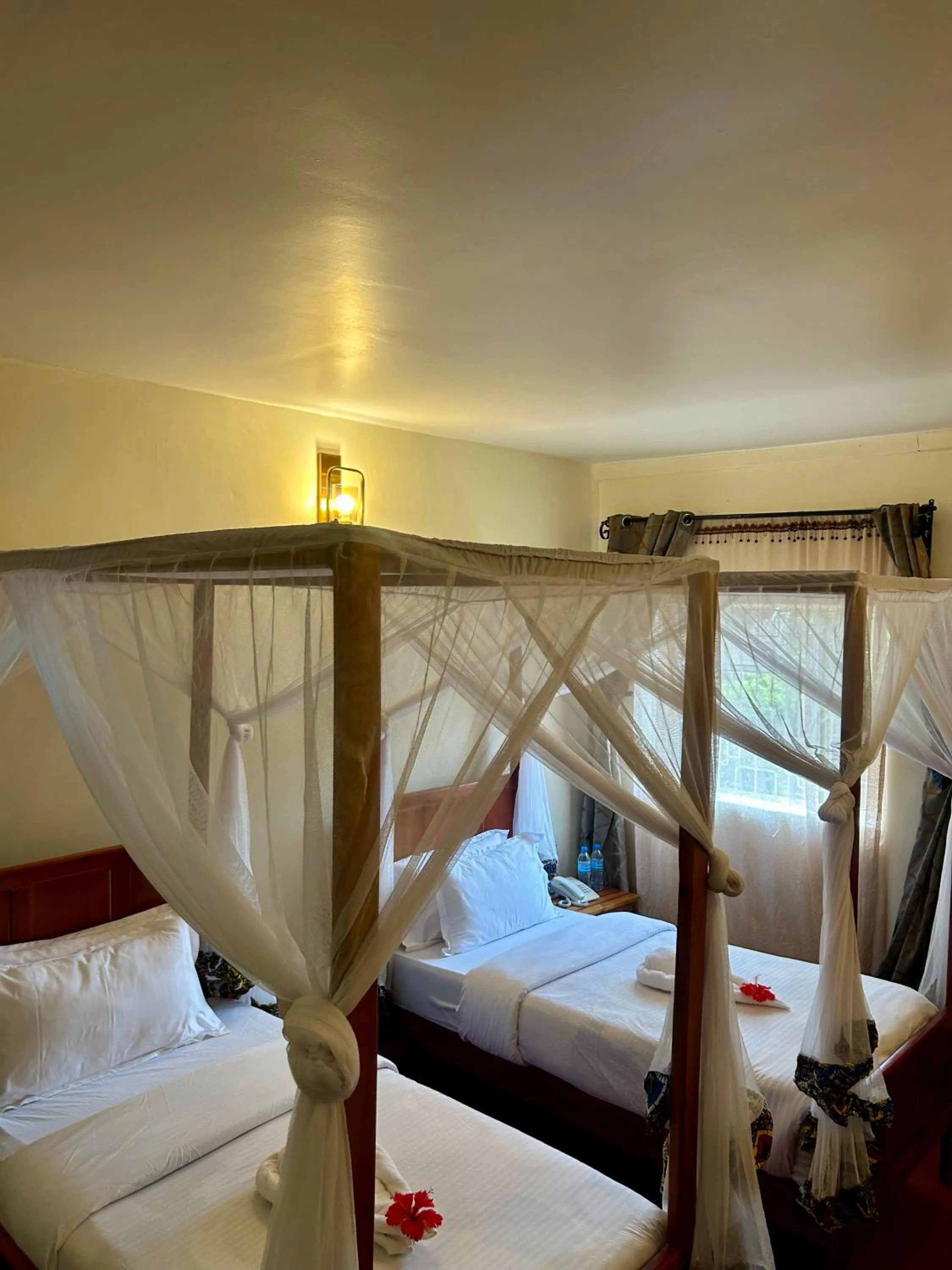 Bed in Patamu Restaurants Lodge & Safaris
