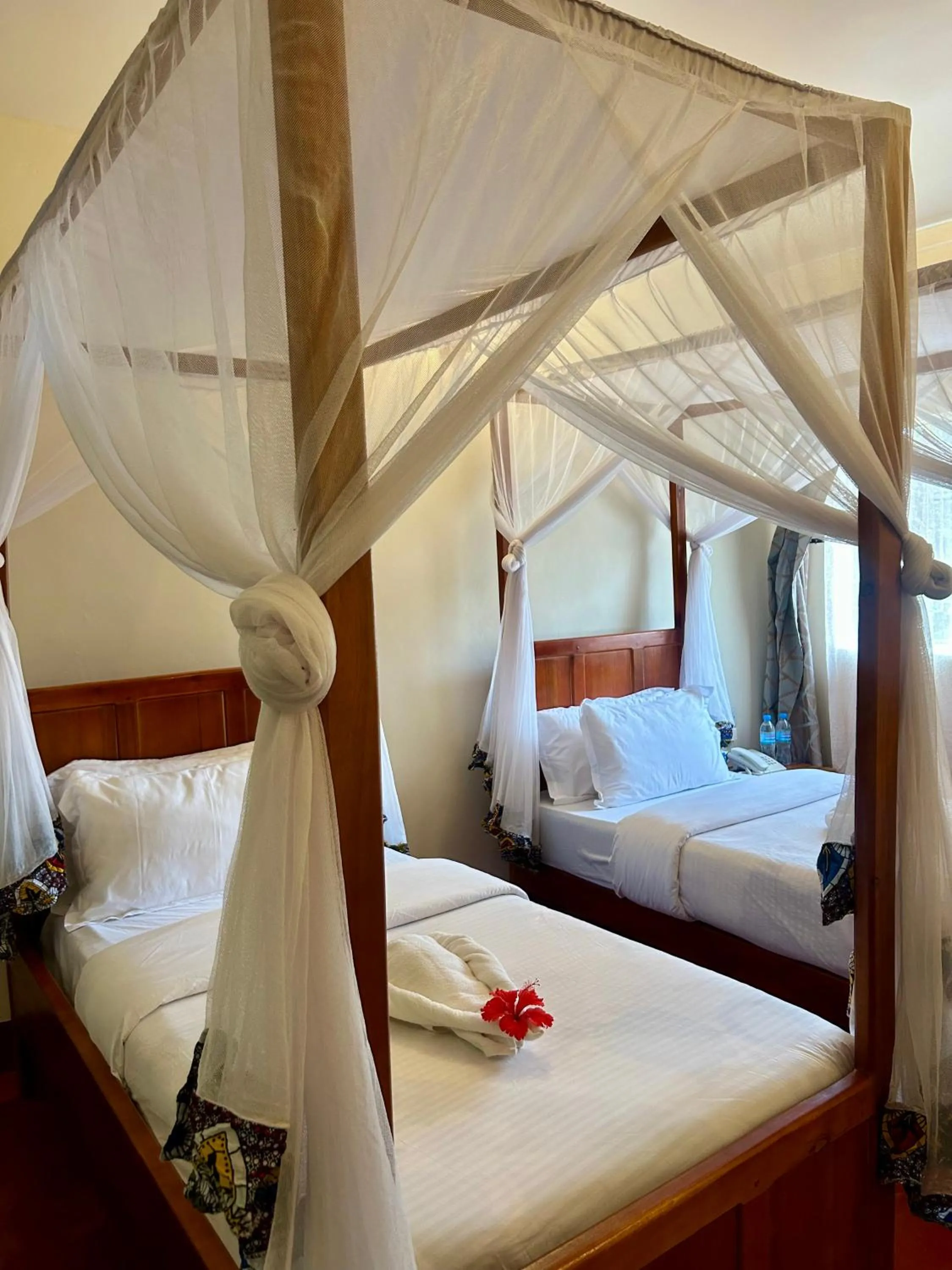 Bed in Patamu Restaurants Lodge & Safaris