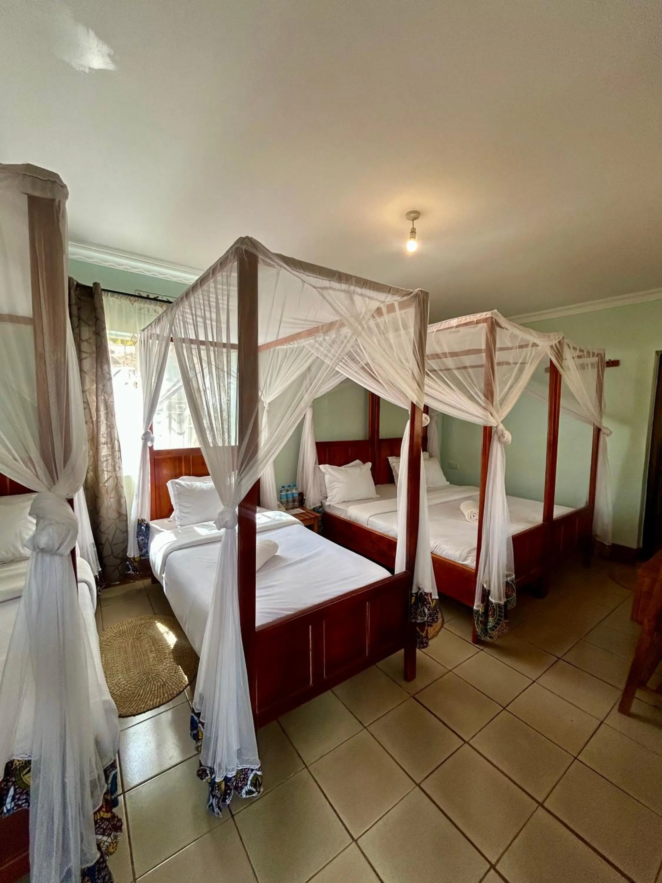 Bed in Patamu Restaurants Lodge & Safaris