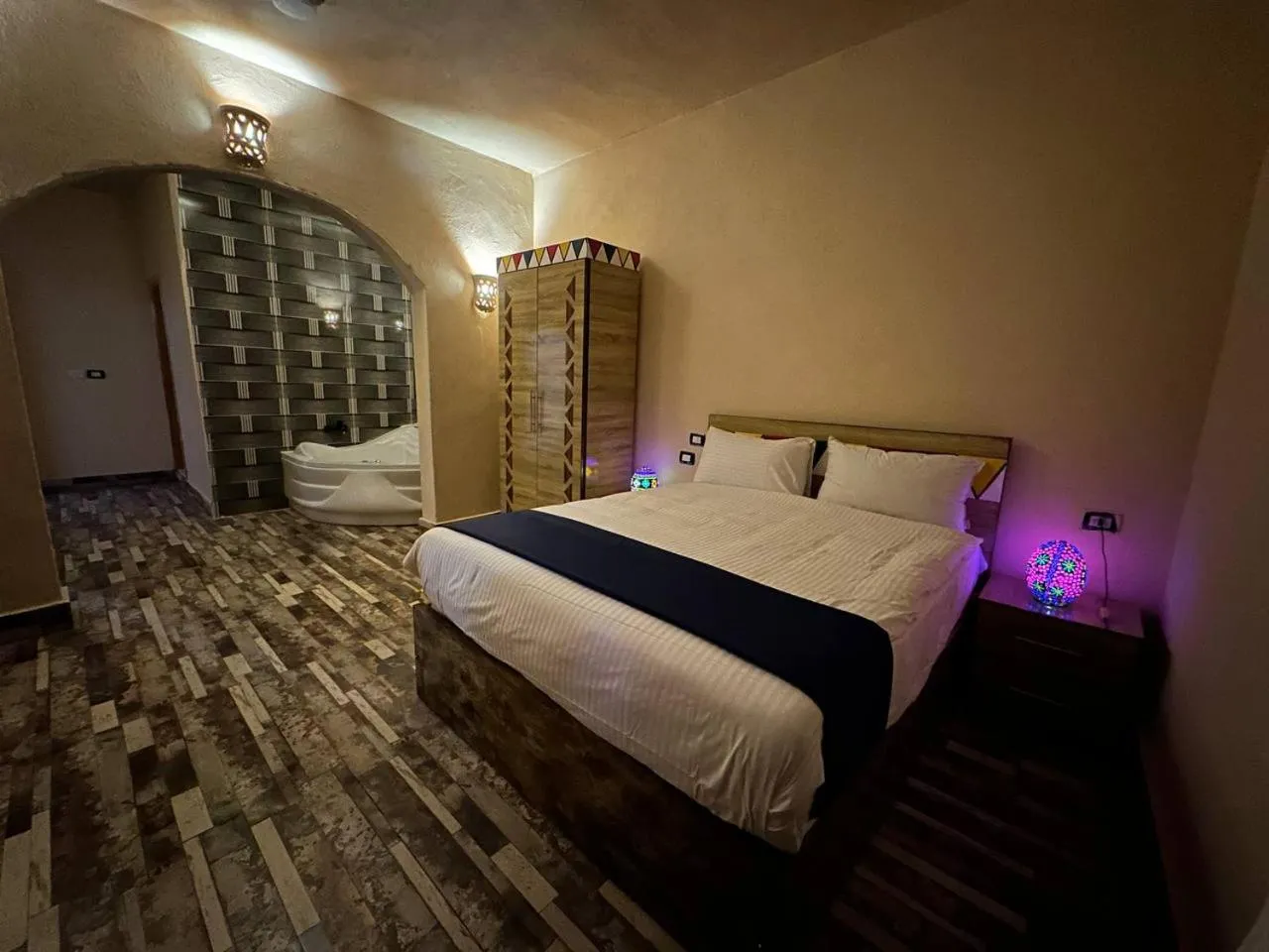 Photo of the whole room, Bed in ACHERTOD Nubian House