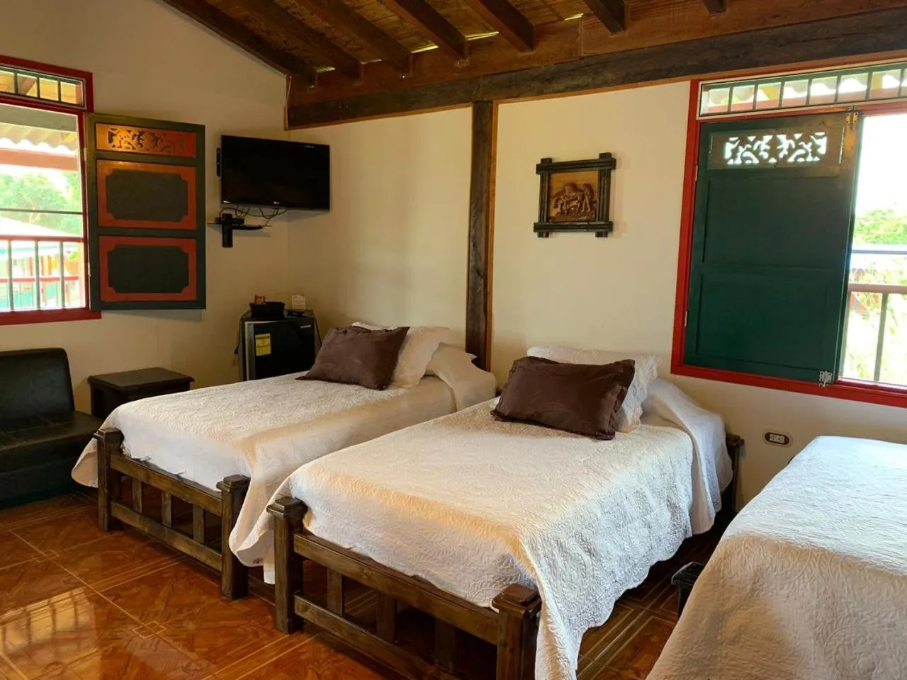Communal lounge/ TV room, Bed in Finca Hotel la Manuela