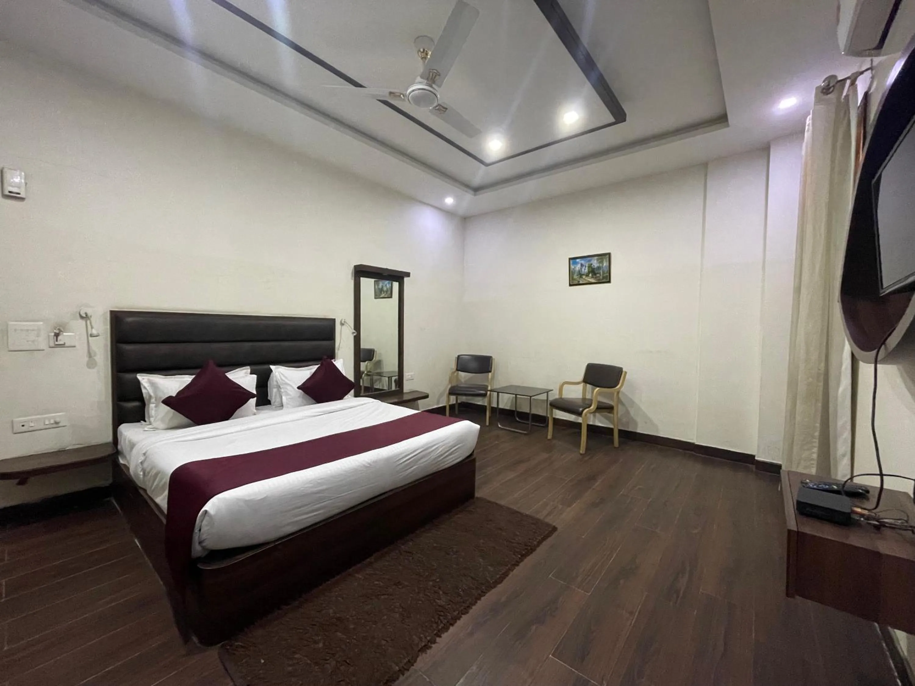 Bed in Hotel Opal Courtyard