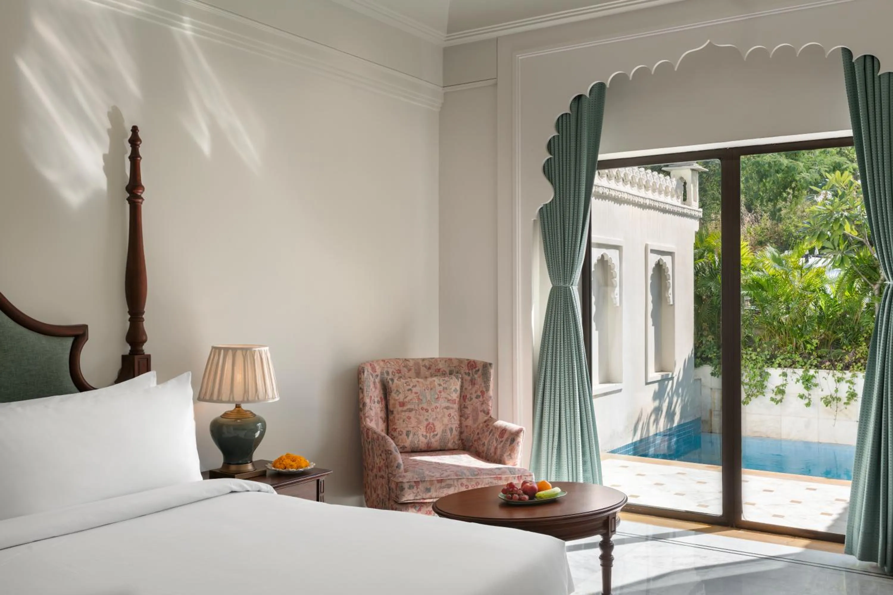 Photo of the whole room, Bed in Bhairavgarh Palace Udaipur