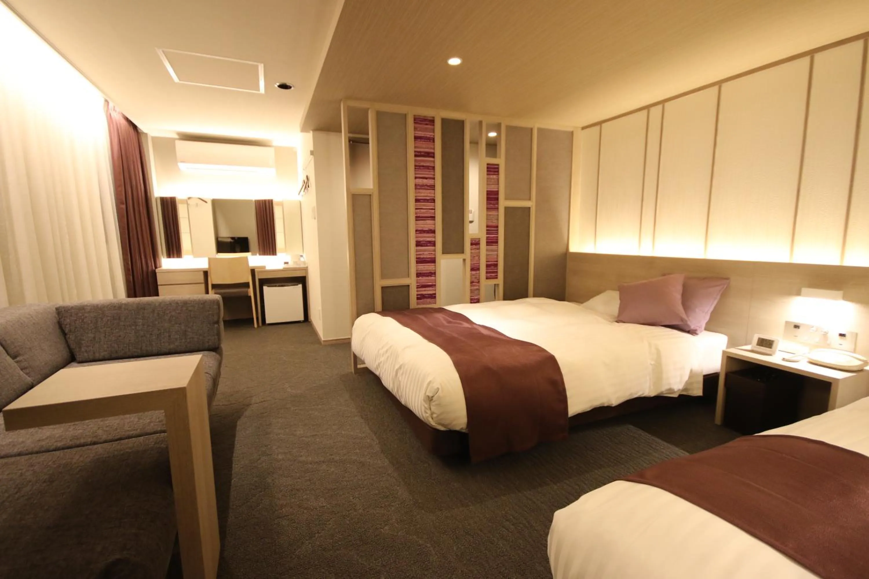 Bed in Kita Hotel