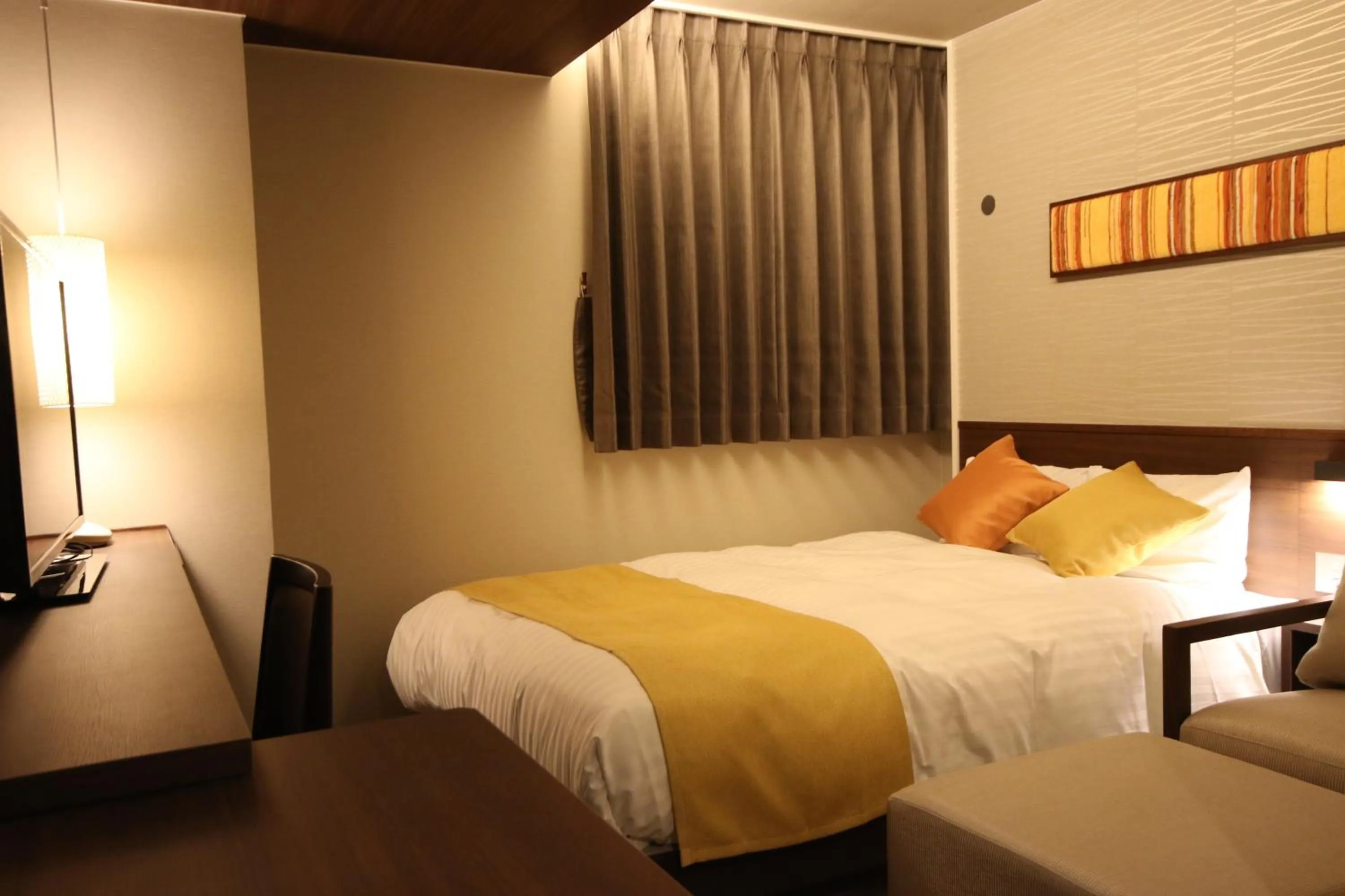 Bed in Kita Hotel