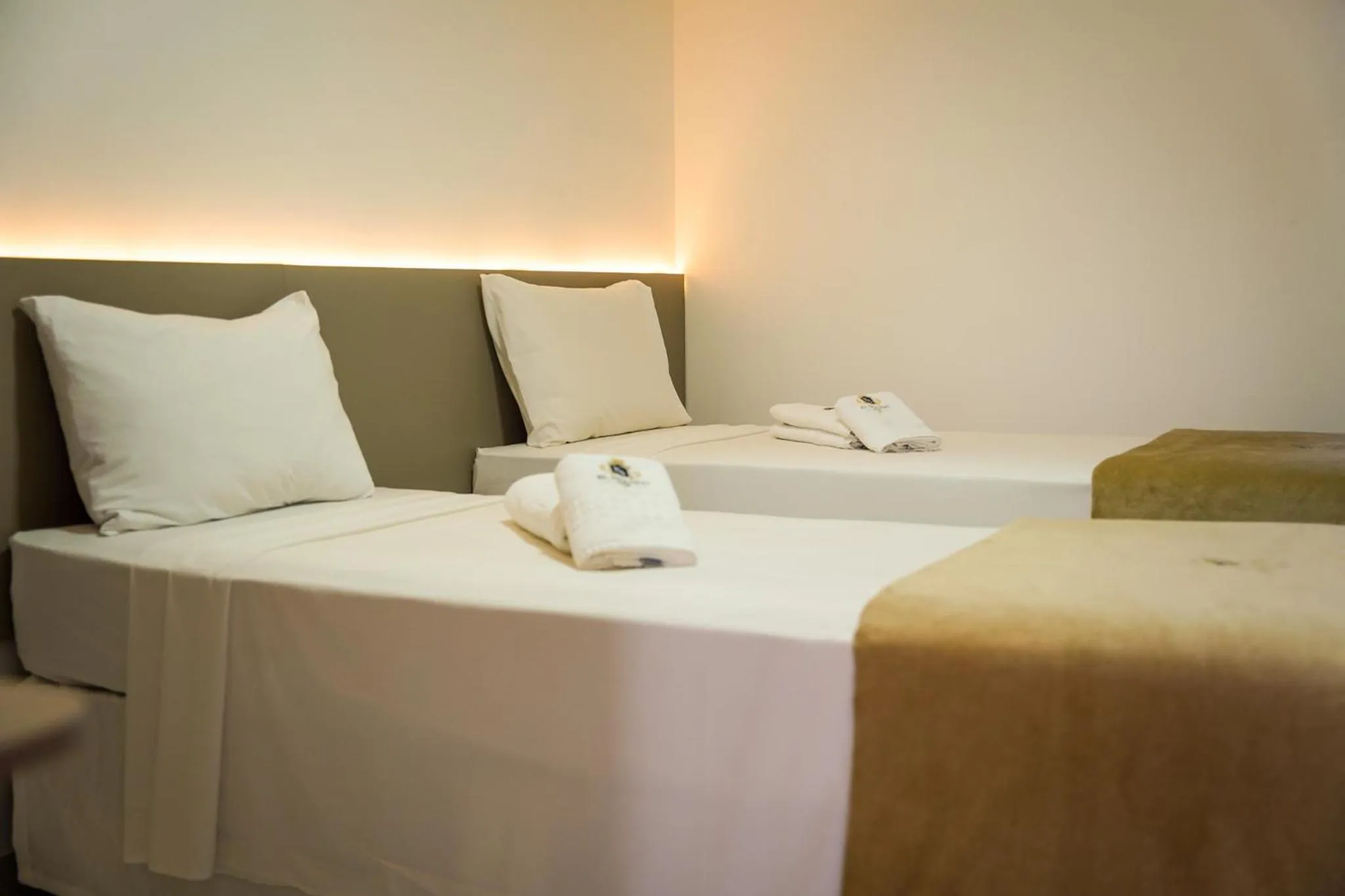 Bed in EL SHADDAI HOTEL