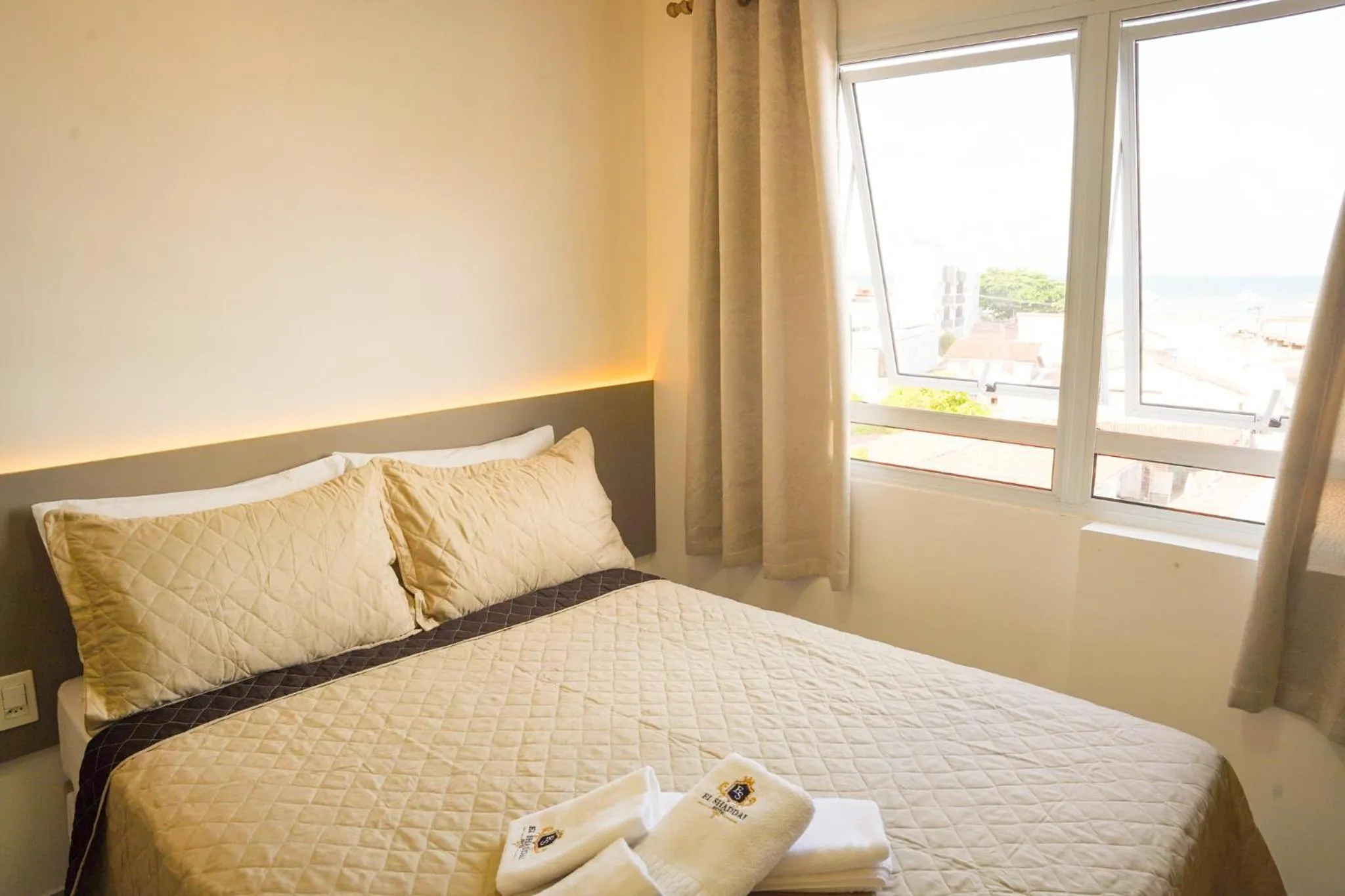 Bed in EL SHADDAI HOTEL