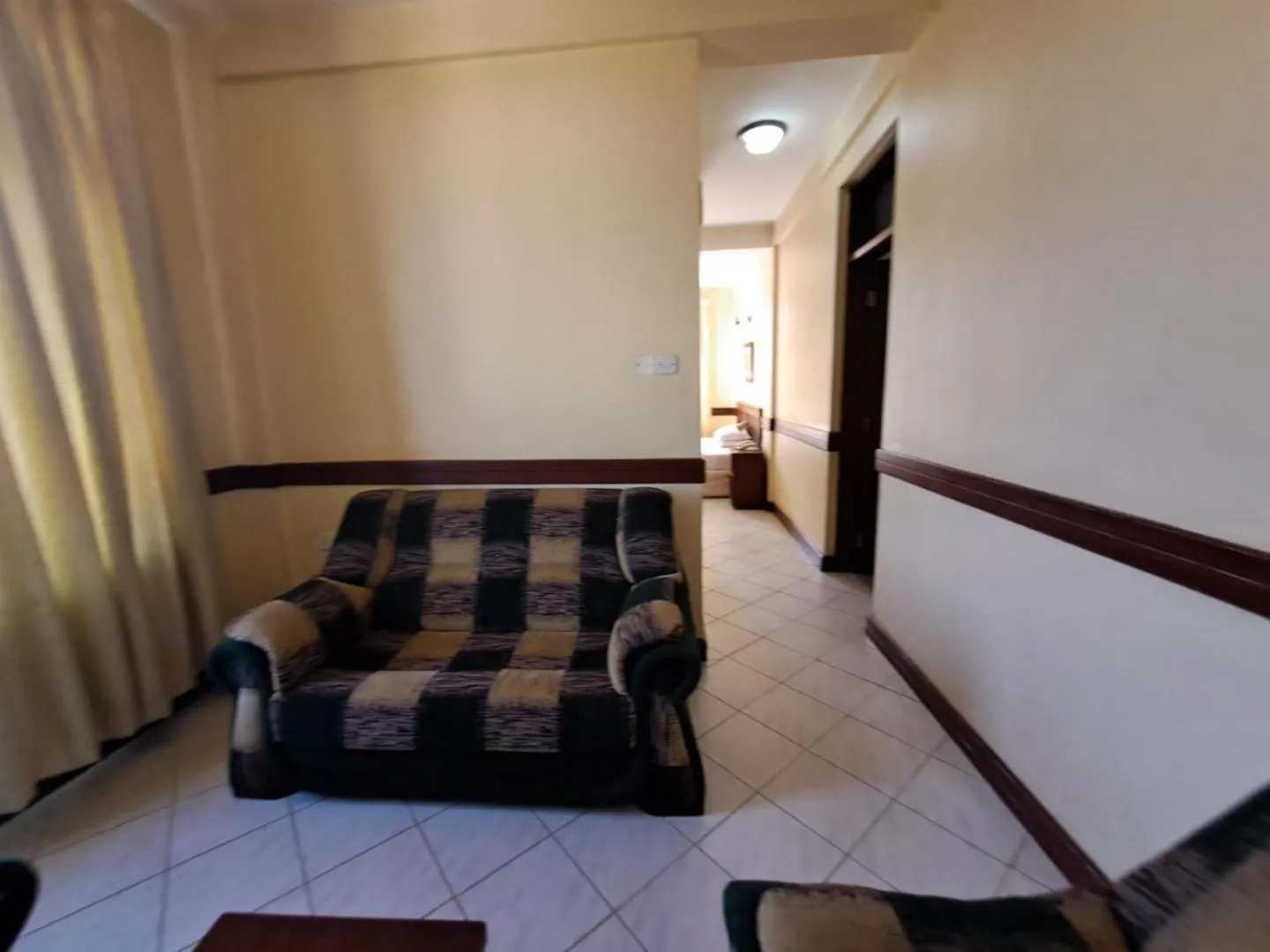 Living room, Bed in Moshi Leopard Hotel