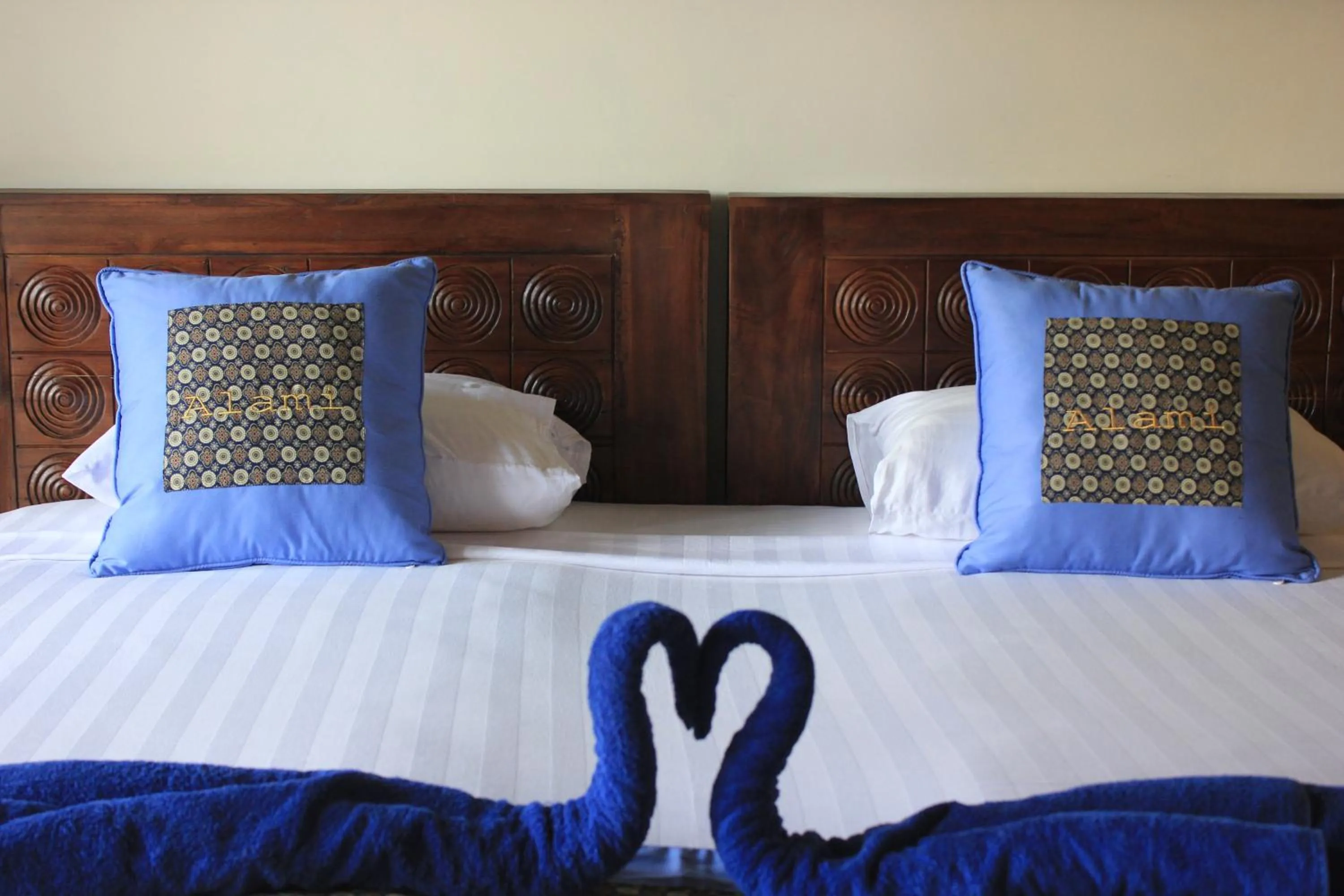 Bed in Alami Resort, Restaurant and Dive Center
