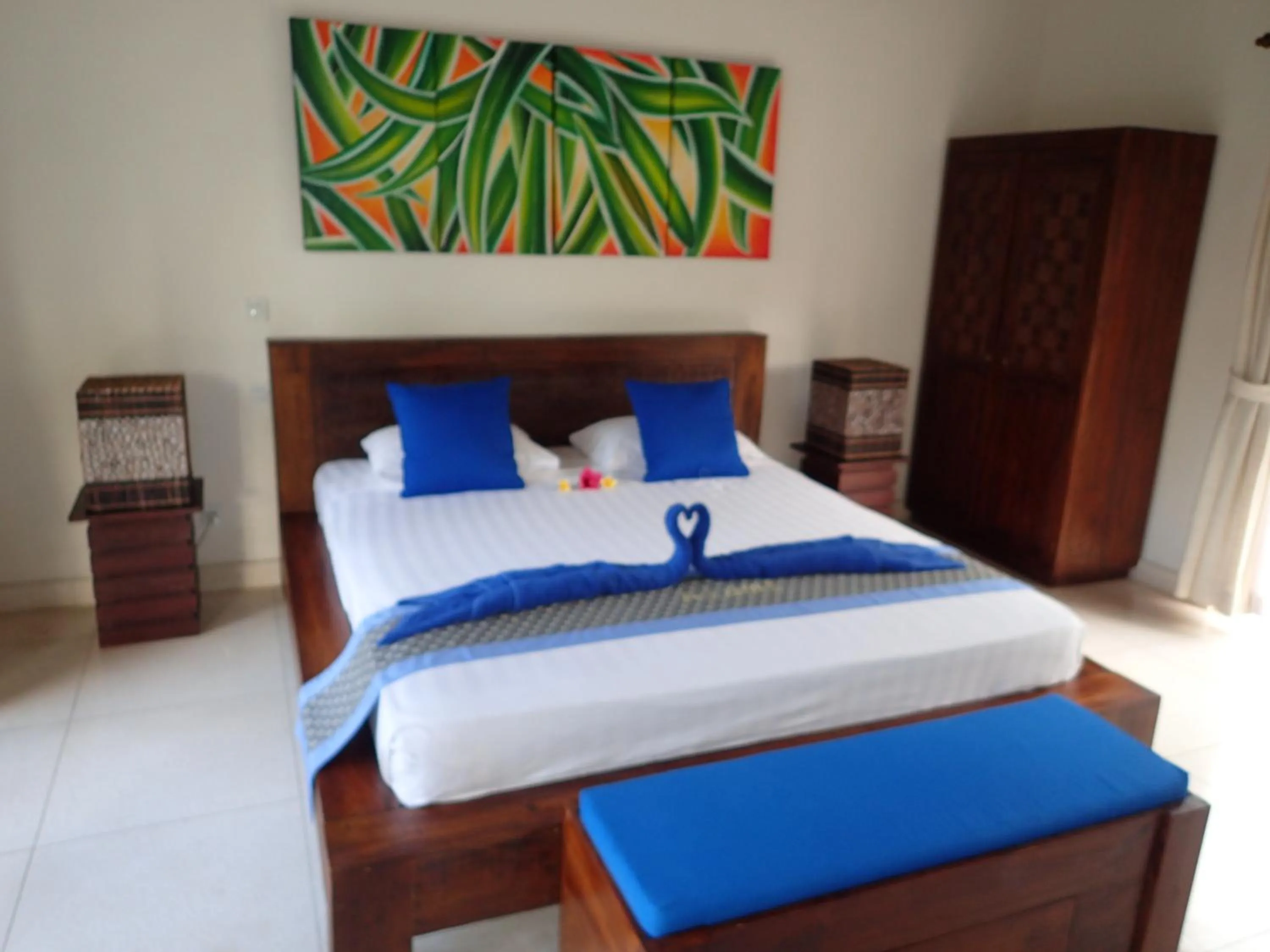 Bed in Alami Resort, Restaurant and Dive Center