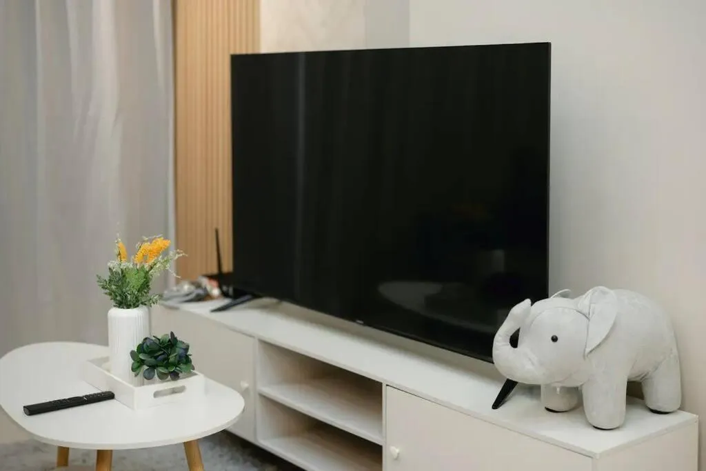 TV and multimedia in Cozy Skyline Retreat at Trion KL, Level 63